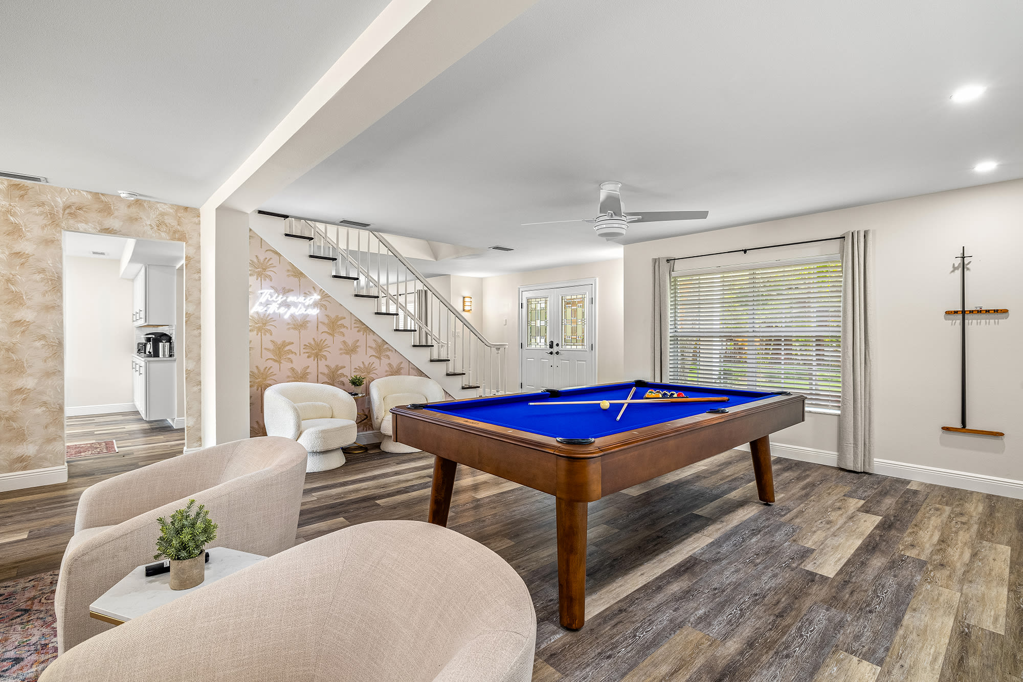 Living Room with Pool Table, Smart TV, and ample seating options