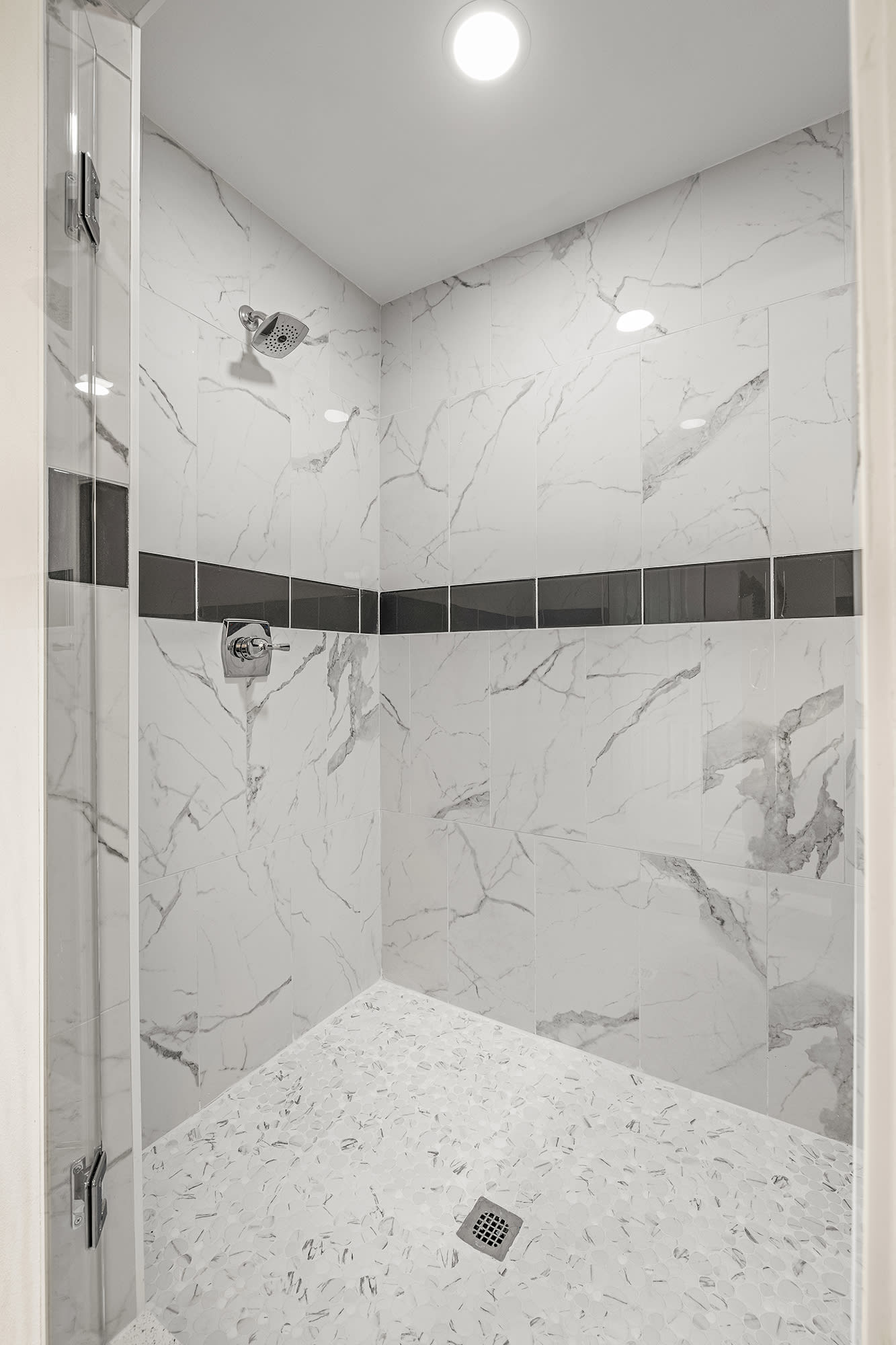 Ensuite bathroom with walk in shower and jetted tub