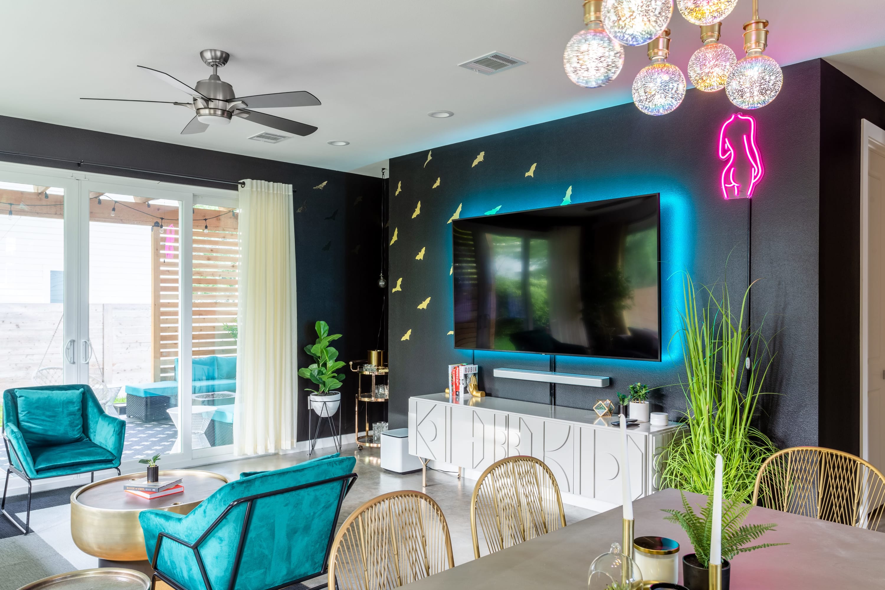 Modern Living Space with Bold Neon Accents, Sleek Design, And a Smart TV