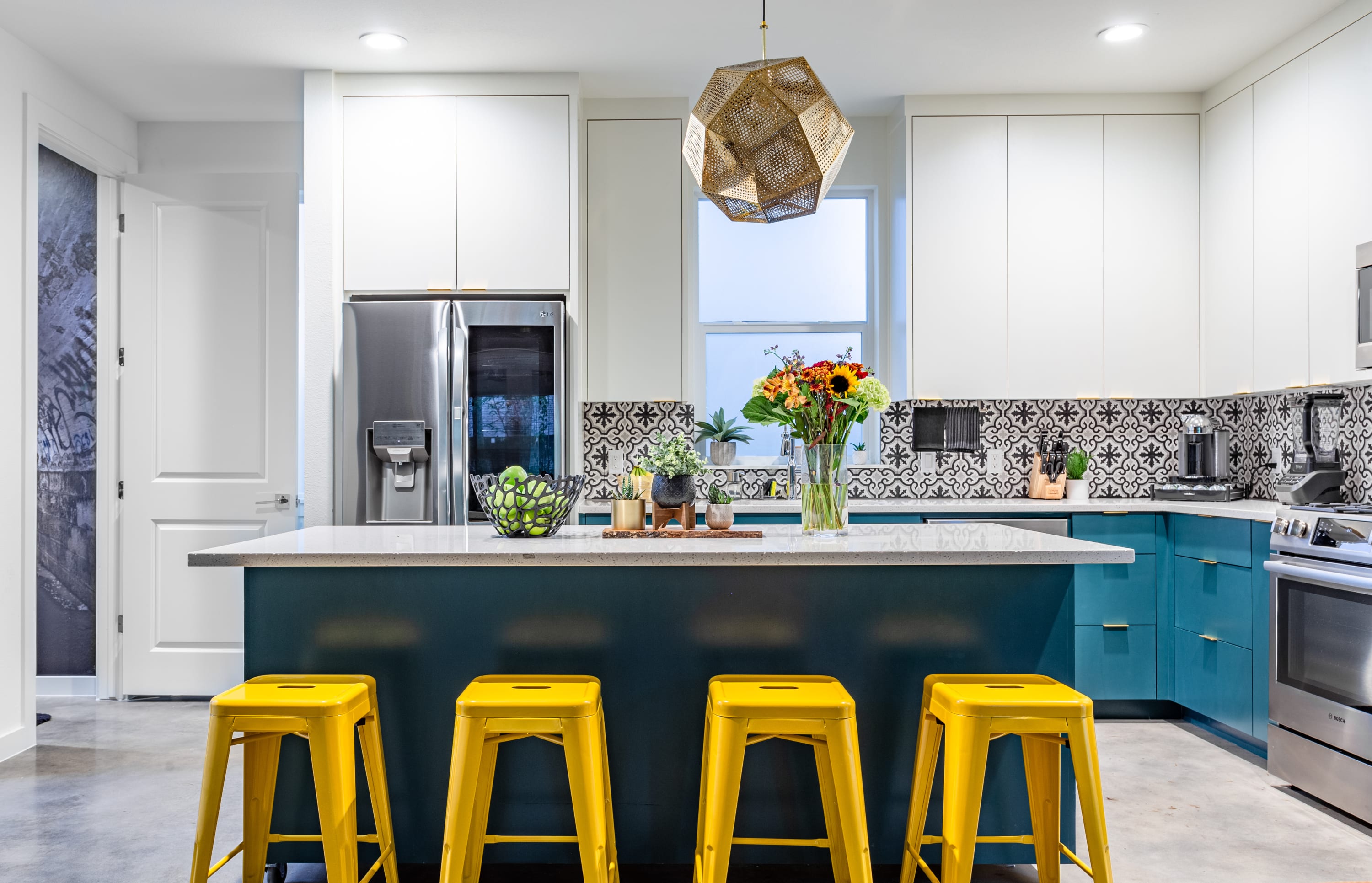 Open-Concept Kitchen, Fully Equipped With Natural Lighting.