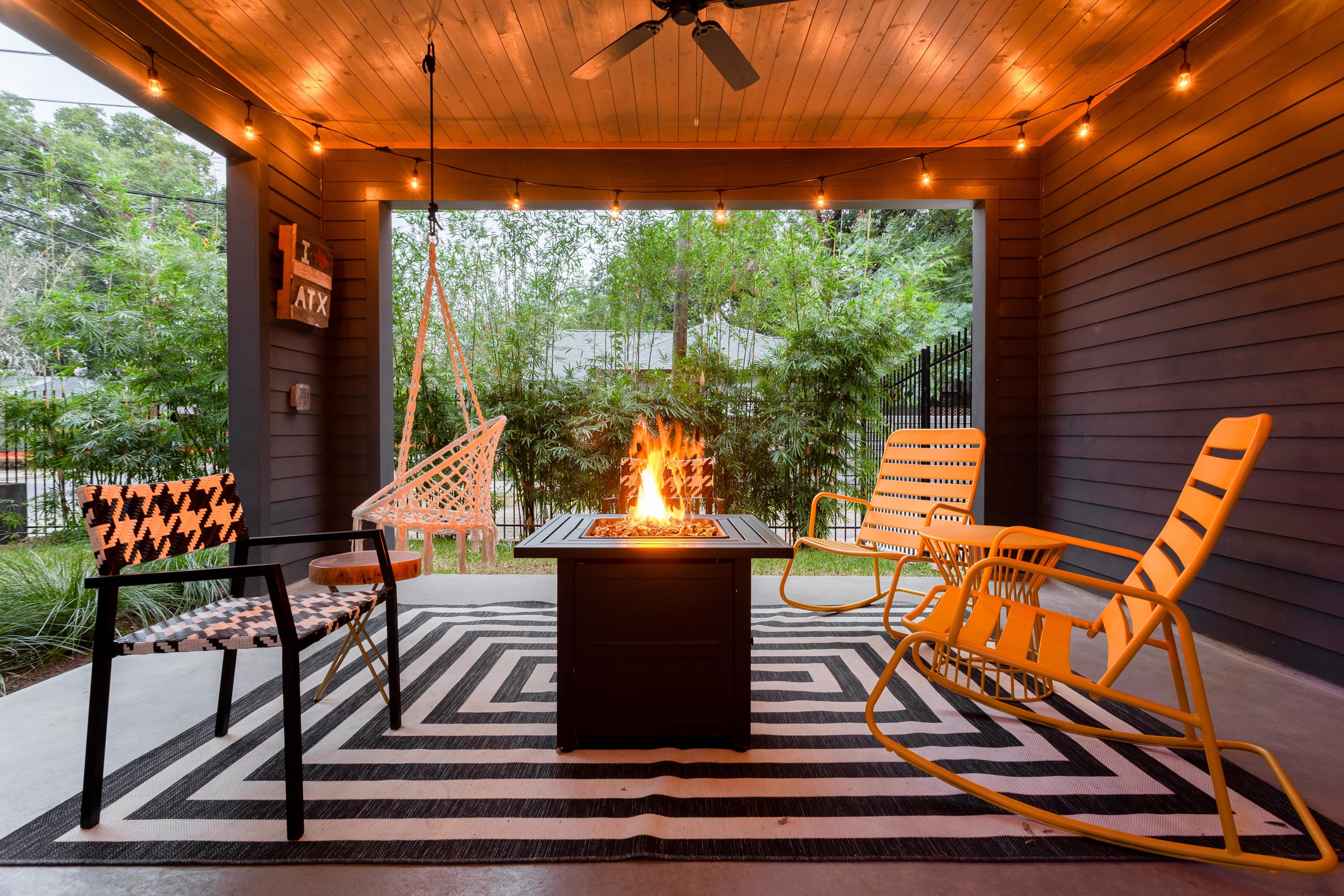 Covered patio lounge with firetable