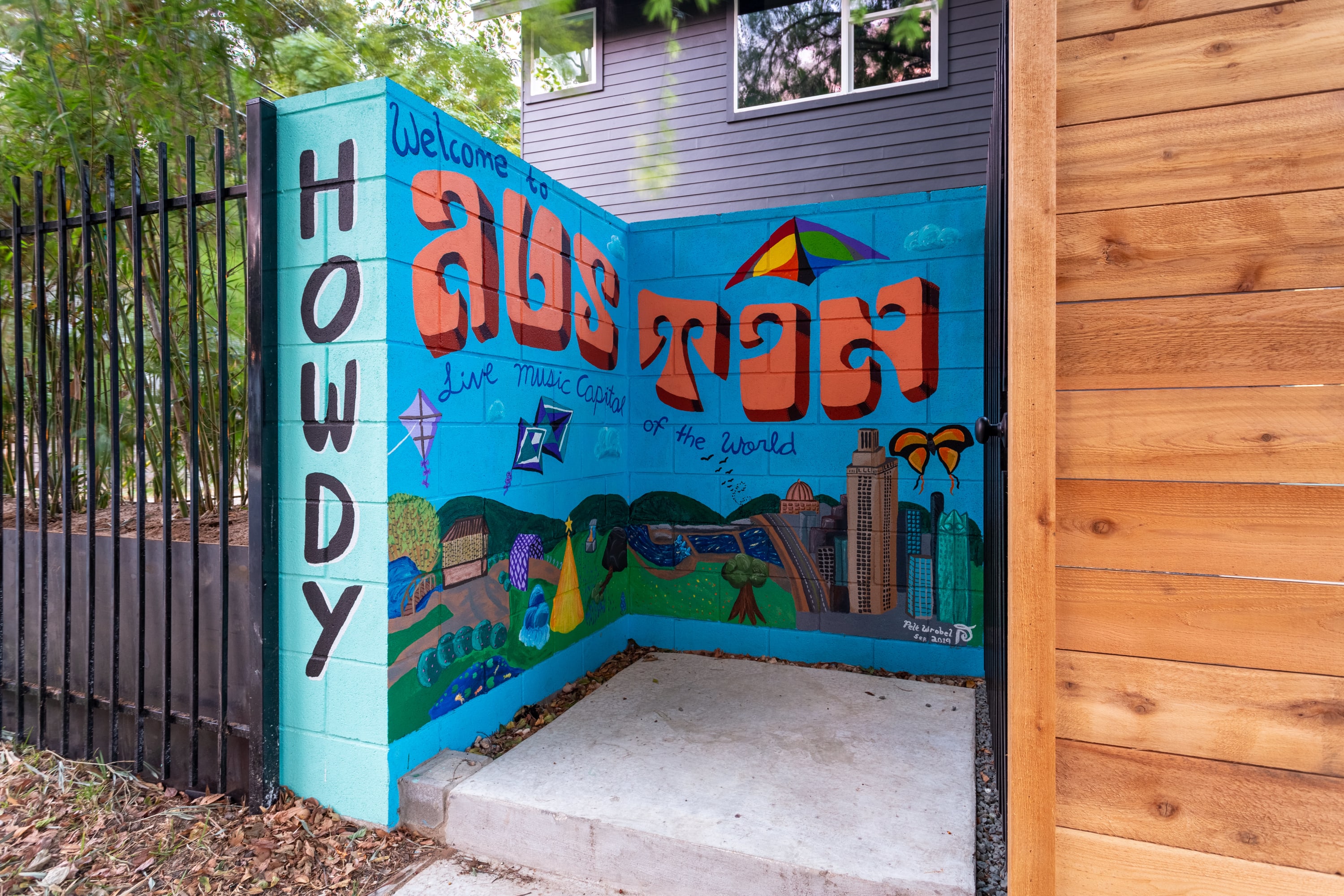 Vibrant Entryway With Artistic Mural