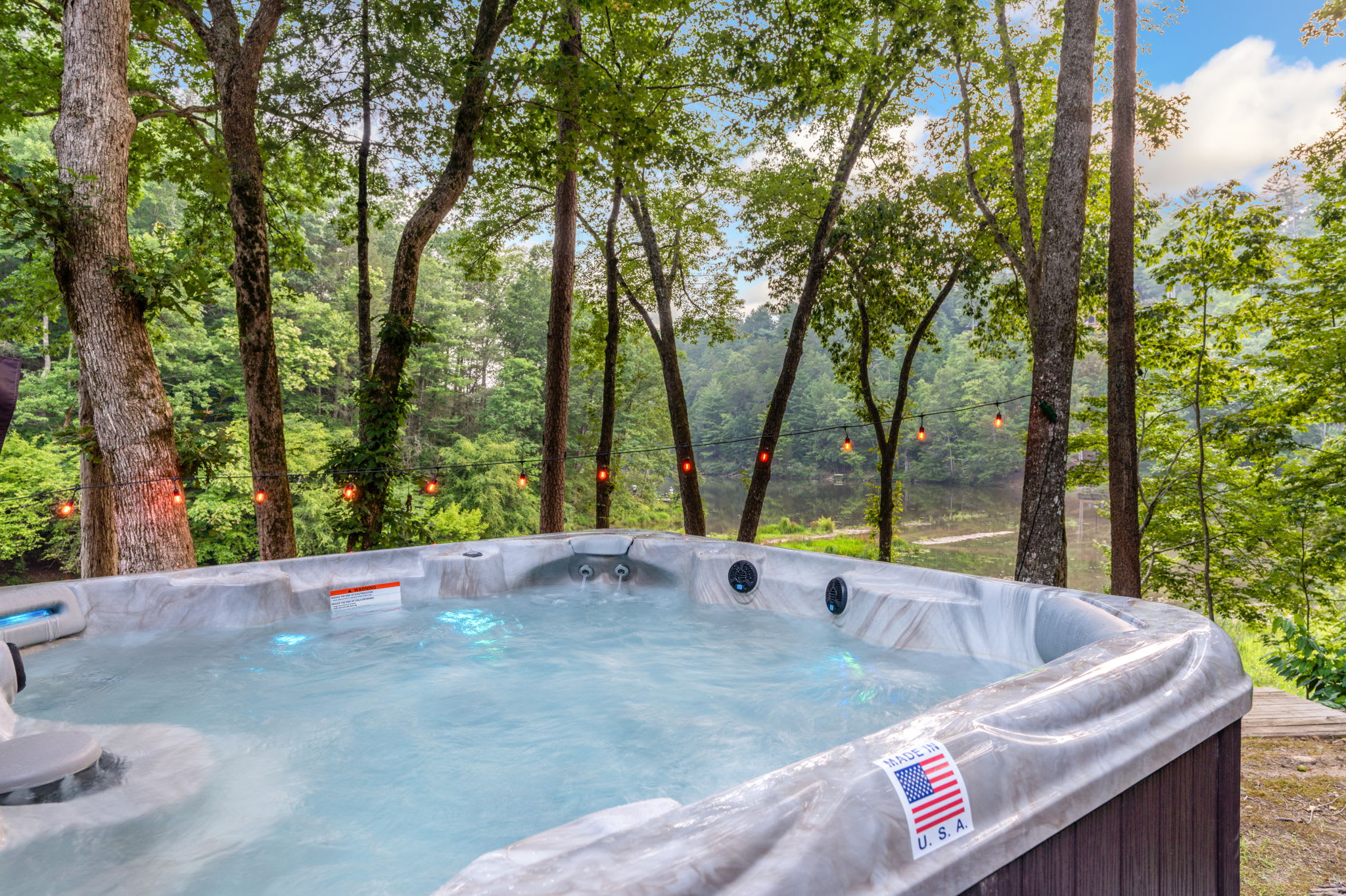 Sit back and relax in our 7 person hot tub- fully equipped with LED lights and bluetooth speakers