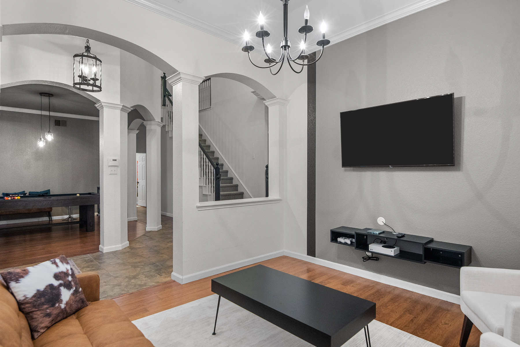 Lounge Room with Xbox, Smart TV, and ample seating.