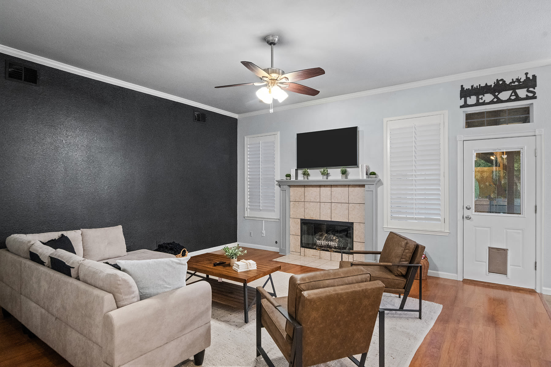 Spacious living room, dining room, and kitchen. This area is perfect for entertaining!