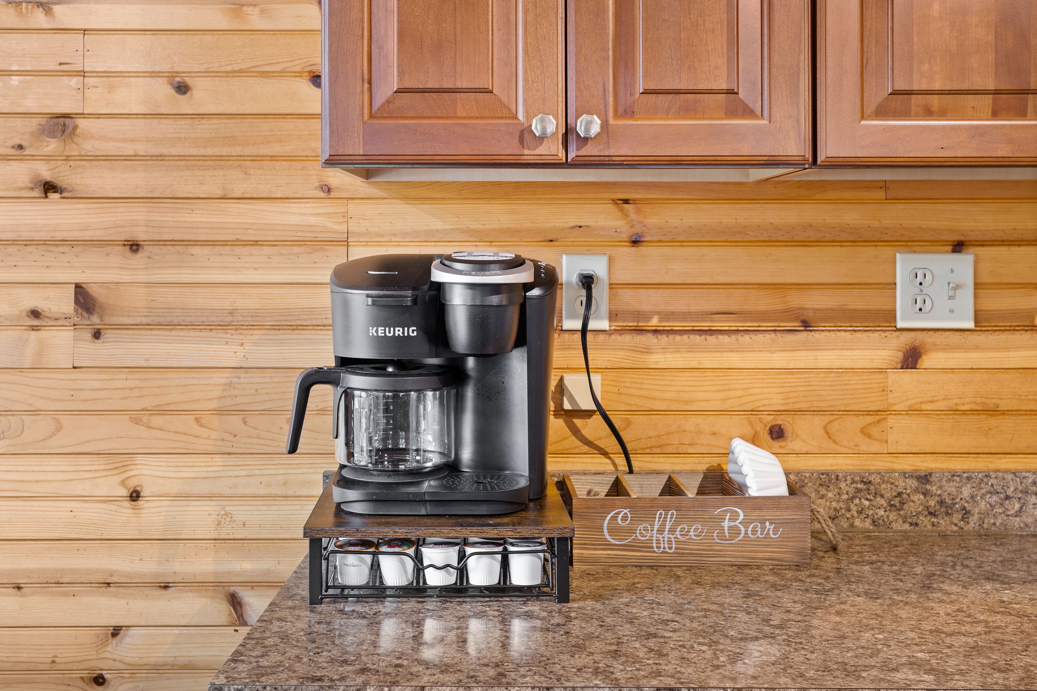 Charming Coffee Bar for Morning Bliss, start your day right with this convenient coffee station, featuring a Keurig and a stylish setup to fuel your mornings with ease.