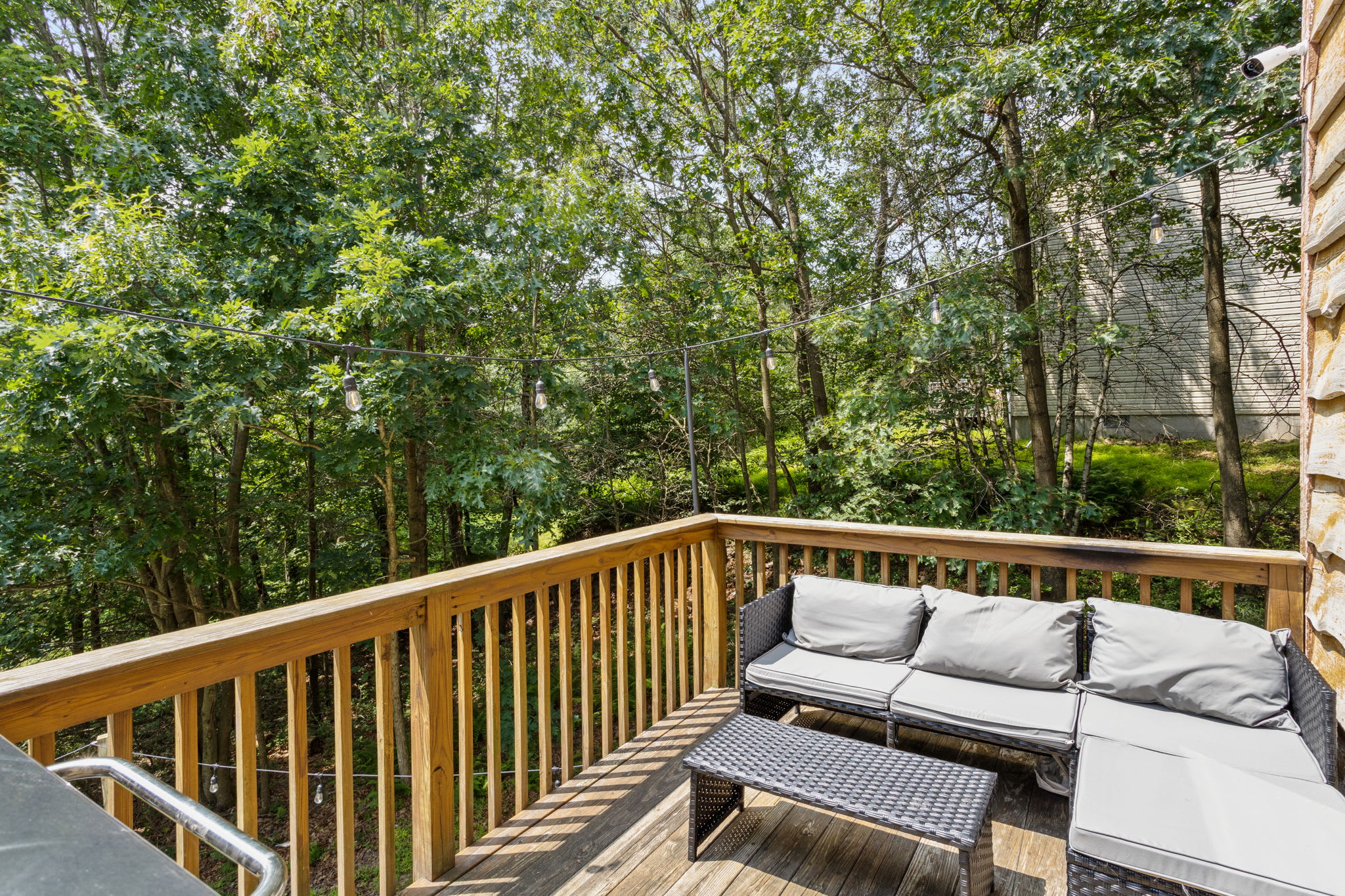 Relax in the Tree-Lined Deck Lounge, unwind on the comfortable outdoor seating and take in the peaceful natural surroundings from this private retreat.