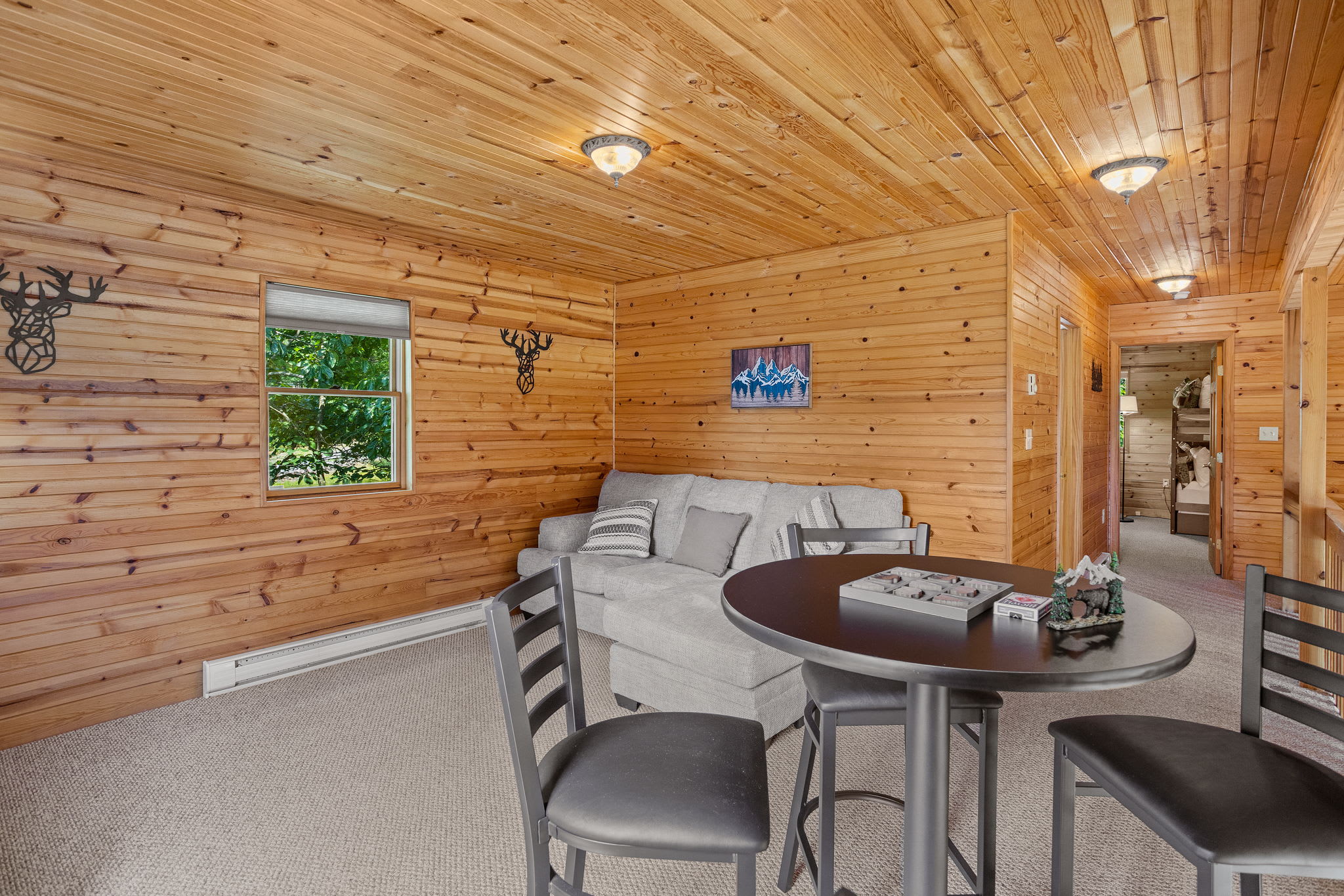 Whether you’re playing games, watching movies, or simply unwinding, this cozy loft area is designed for comfort and fun.