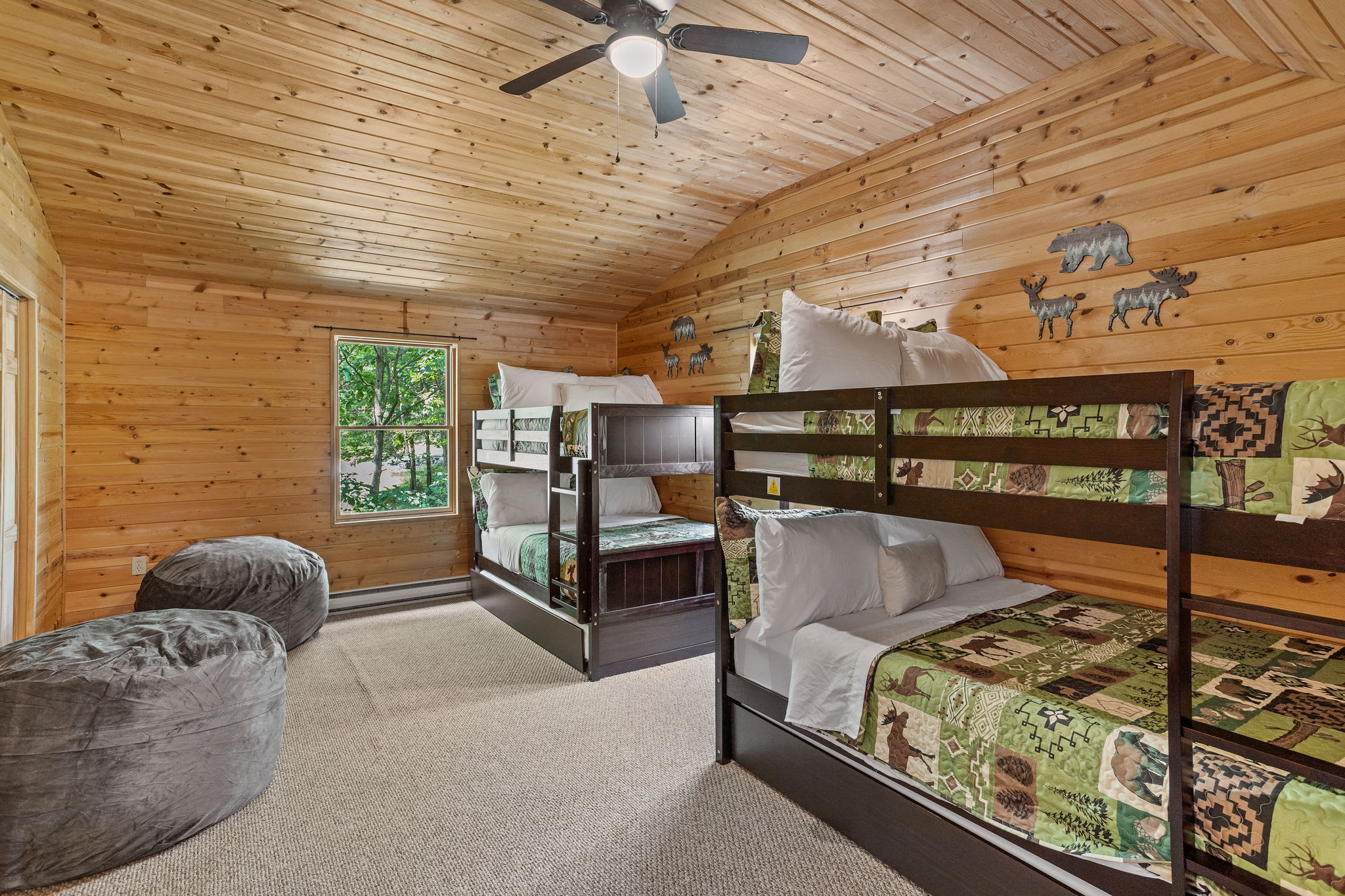 With large windows, high ceilings, and cozy bunk beds, this space is ideal for a fun and relaxing group stay.