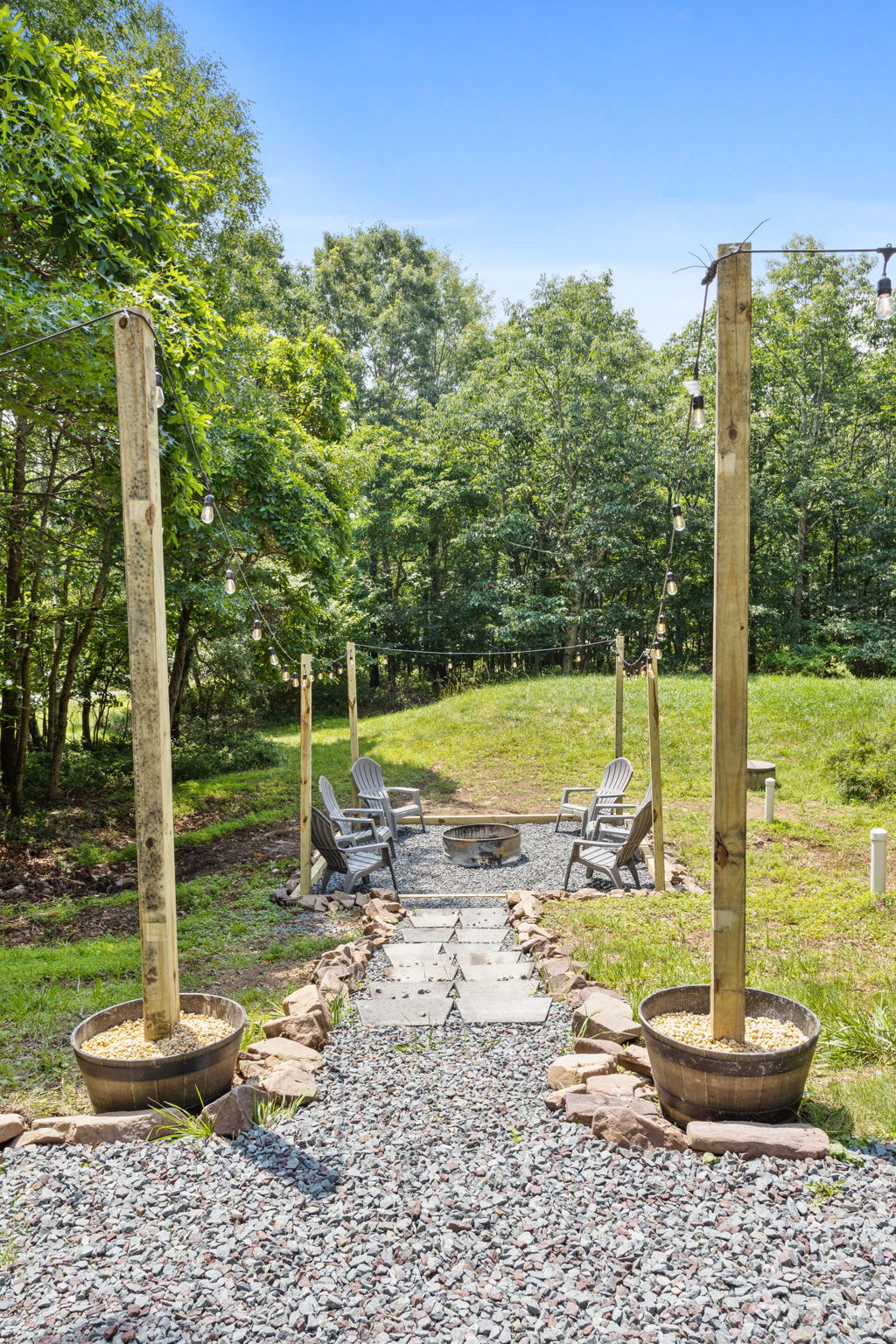 Follow the inviting walkway to this intimate fire pit area, perfect for storytelling and stargazing.