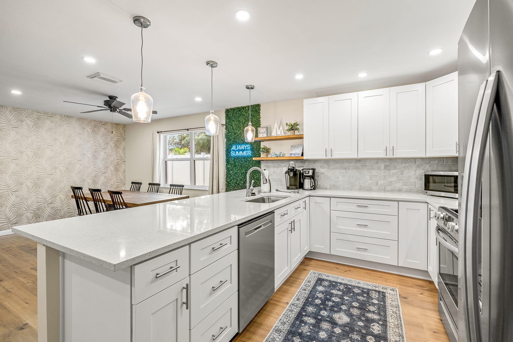 Need to whip up a meal? No problem! The kitchen features stainless steel appliances, a keurig and drip coffee maker, blender, cookware, & more!