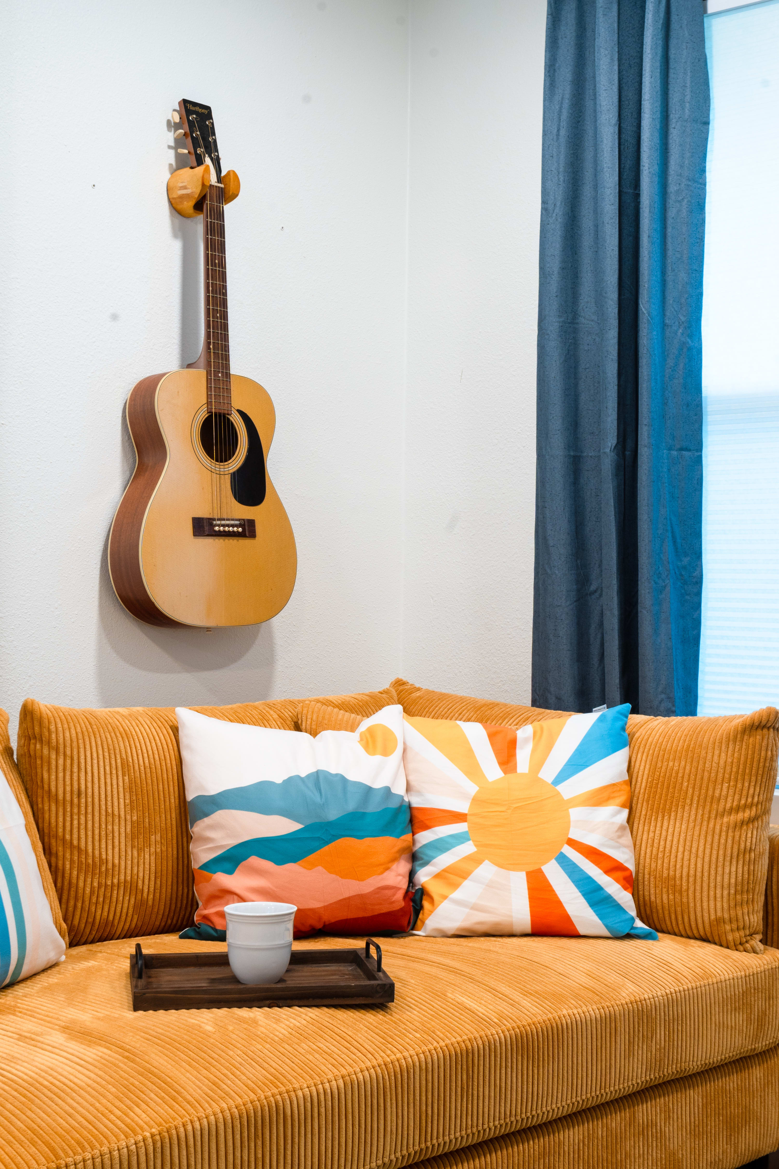 Comfy Sofa and Acoustic Guitar
