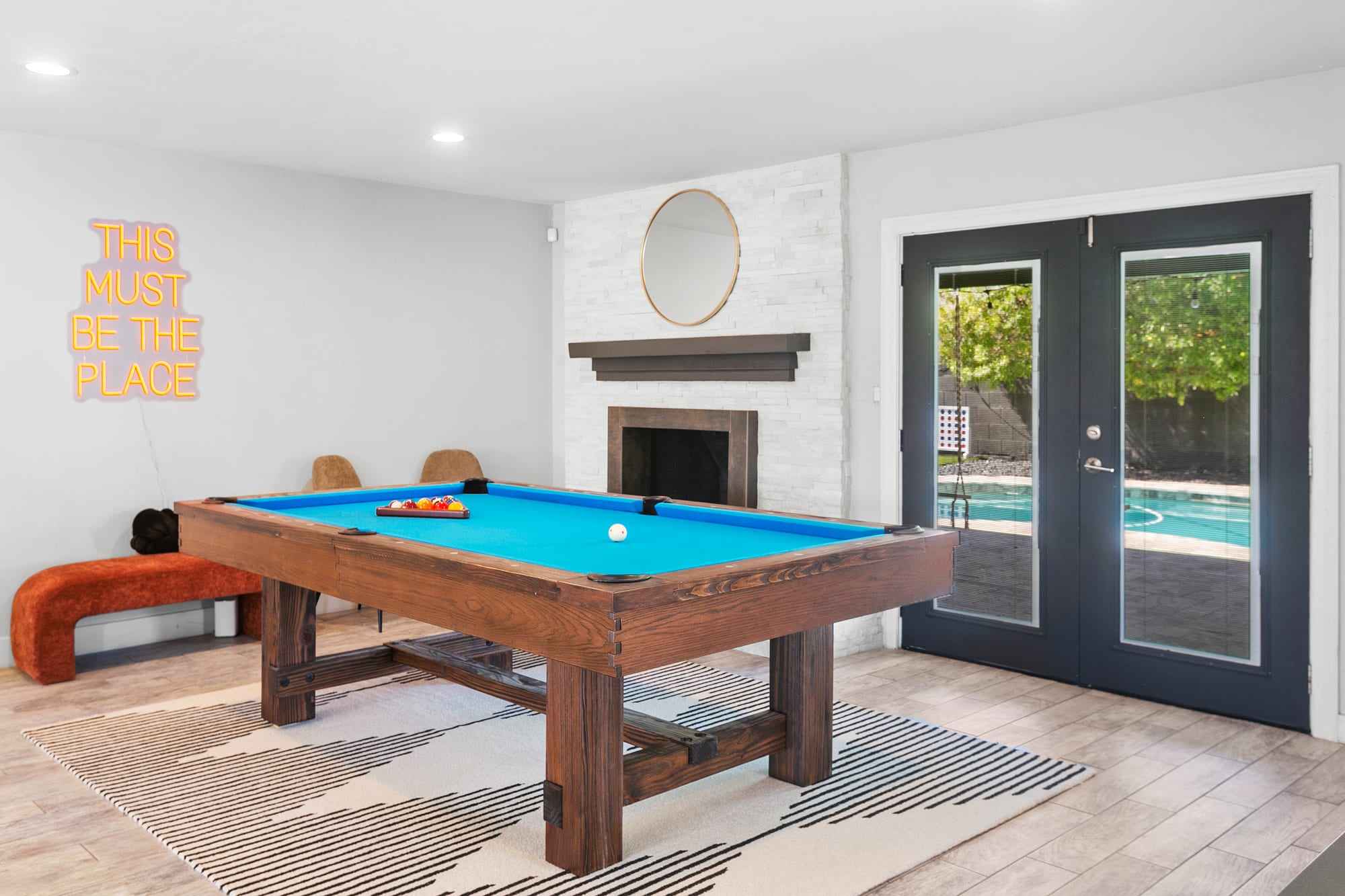 This must be the place- yes! Hang out room with pool table steps away from the heated pool.