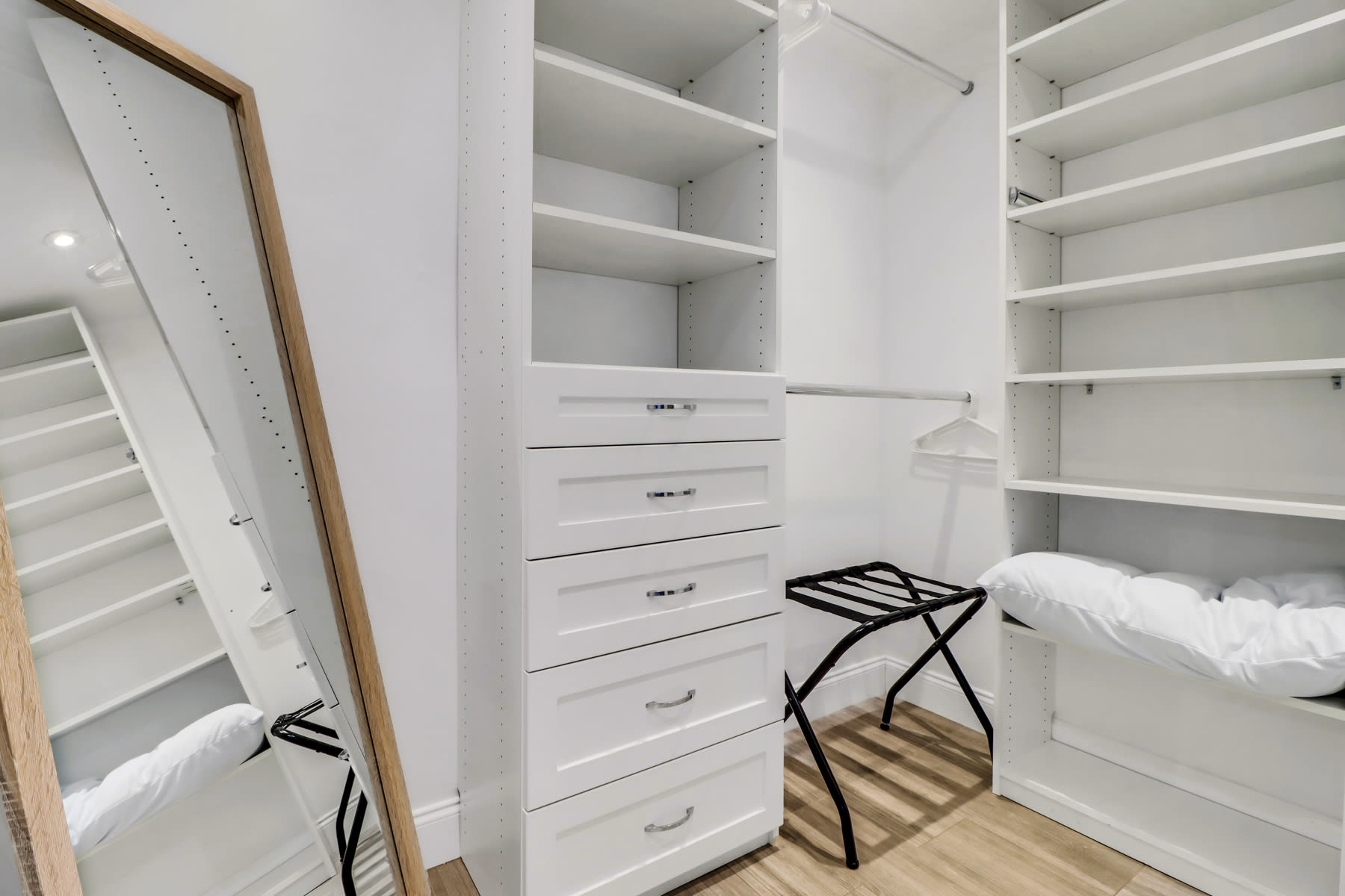 Walk in closet with full body mirror