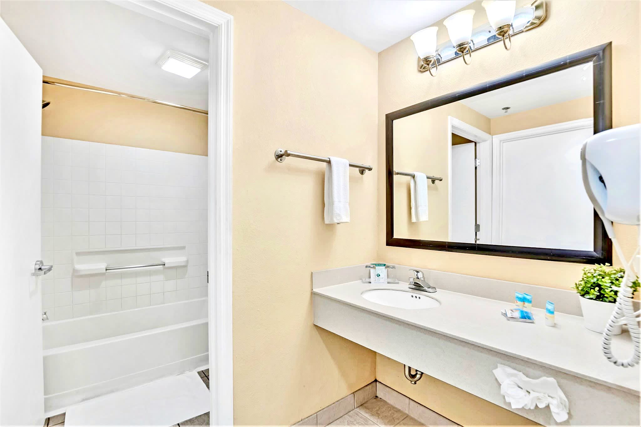 Clean And Modern Bathroom With Shower And Vanity Space