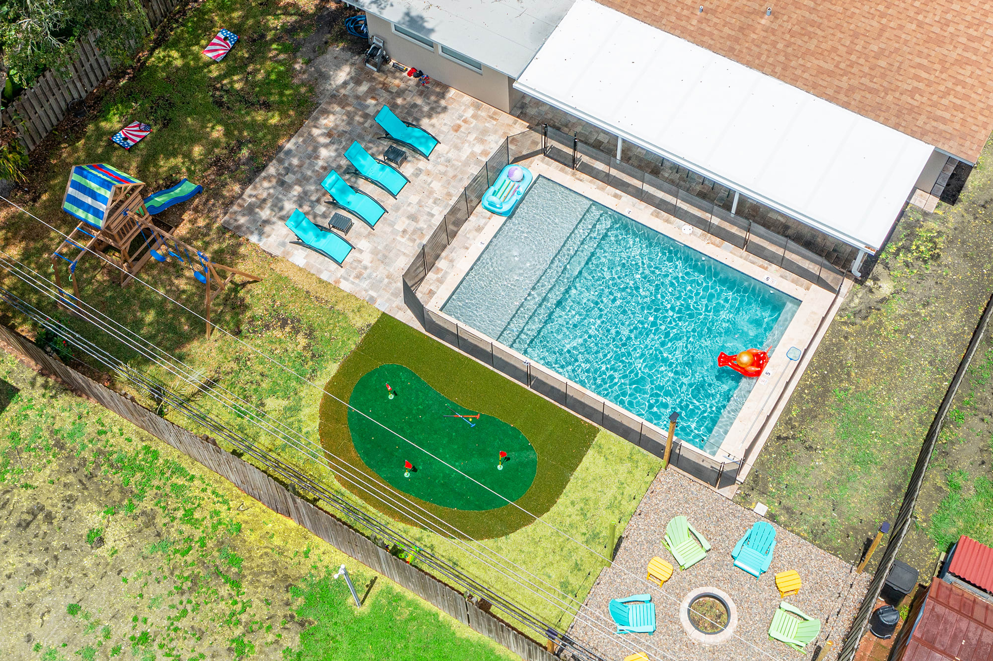 Ariel View of your Outdoor Oasis. Just 2 miles to the beach with all the cool amenities, our 4 bedroom home is perfect for your group.