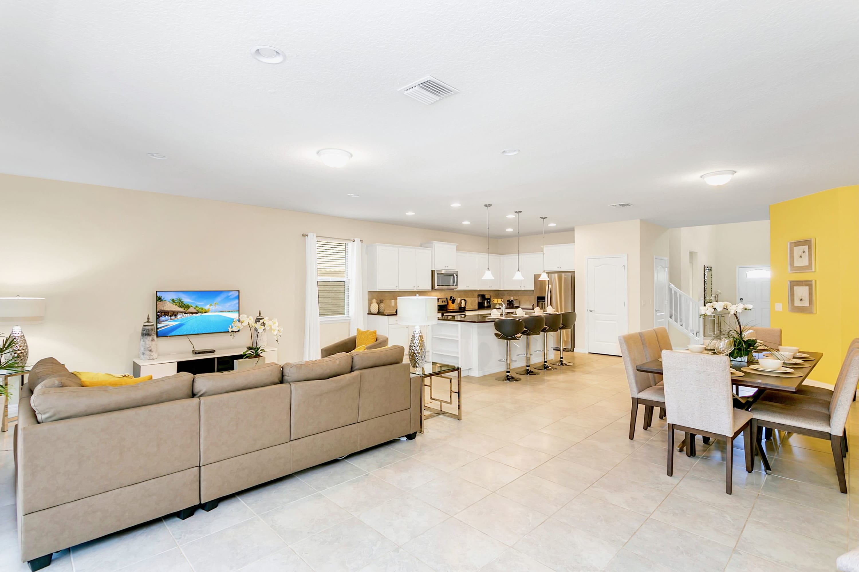 Spacious And Elegant Living Room With Large Smart Tv