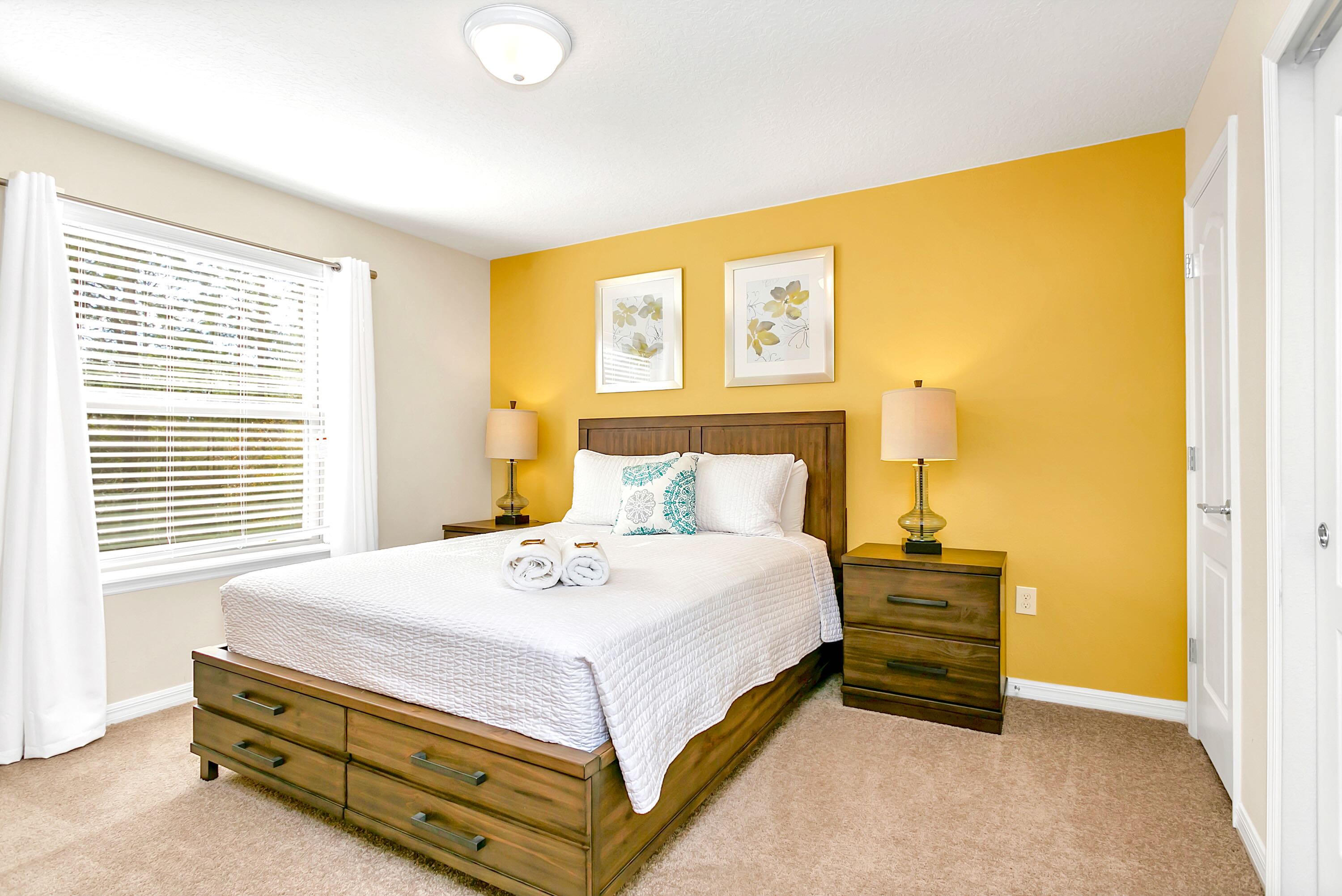 Elegant Bedroom With Queen Bed And Smart Tv