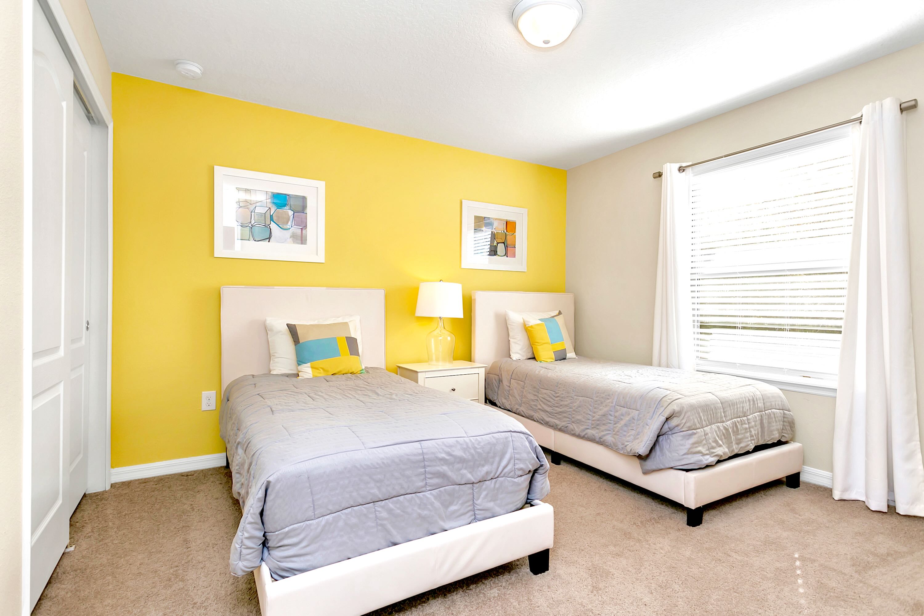 Spacious Bedroom With Two Twin Beds And Smart Tv
