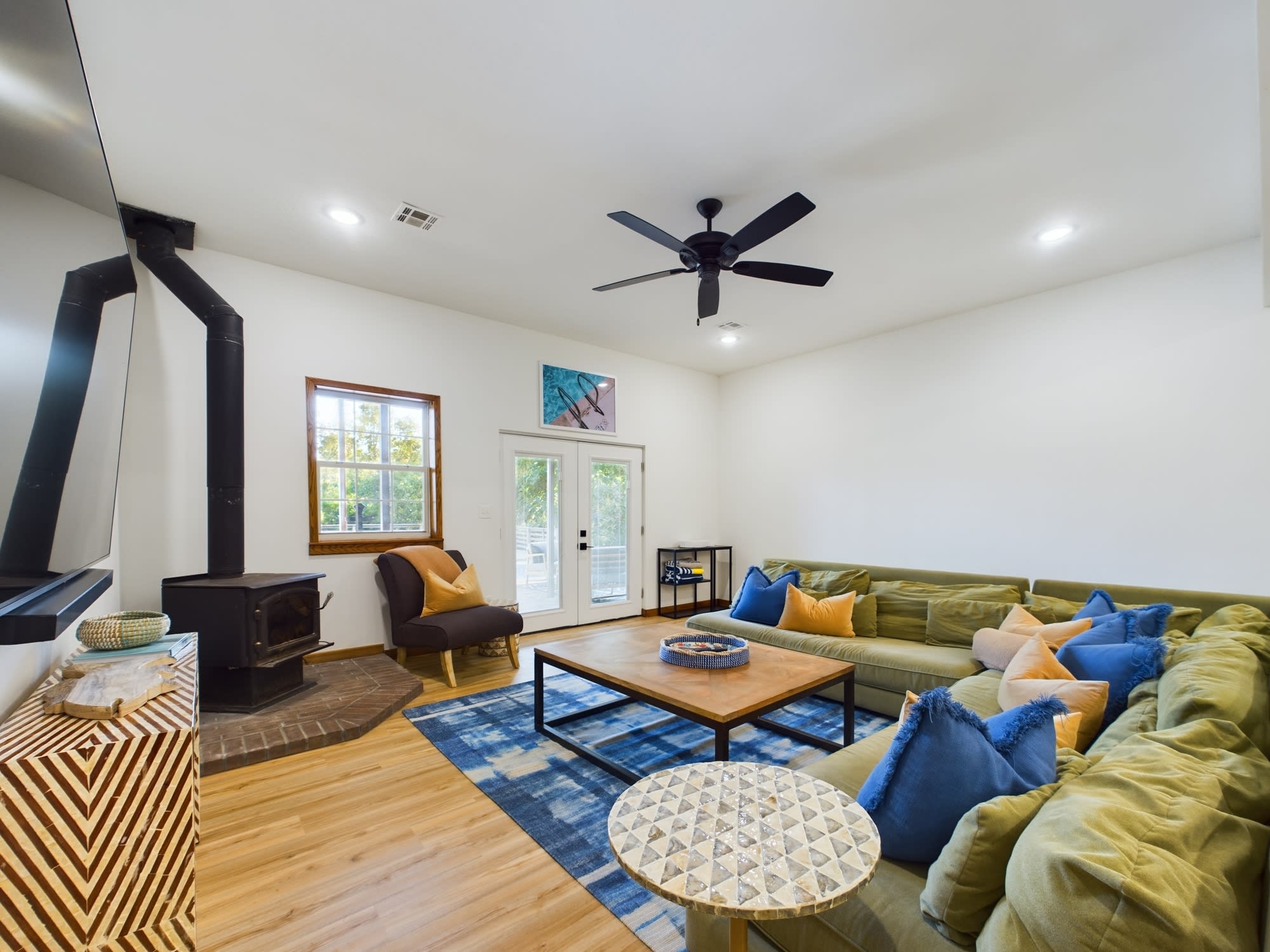 Wood burning stove in basement living area