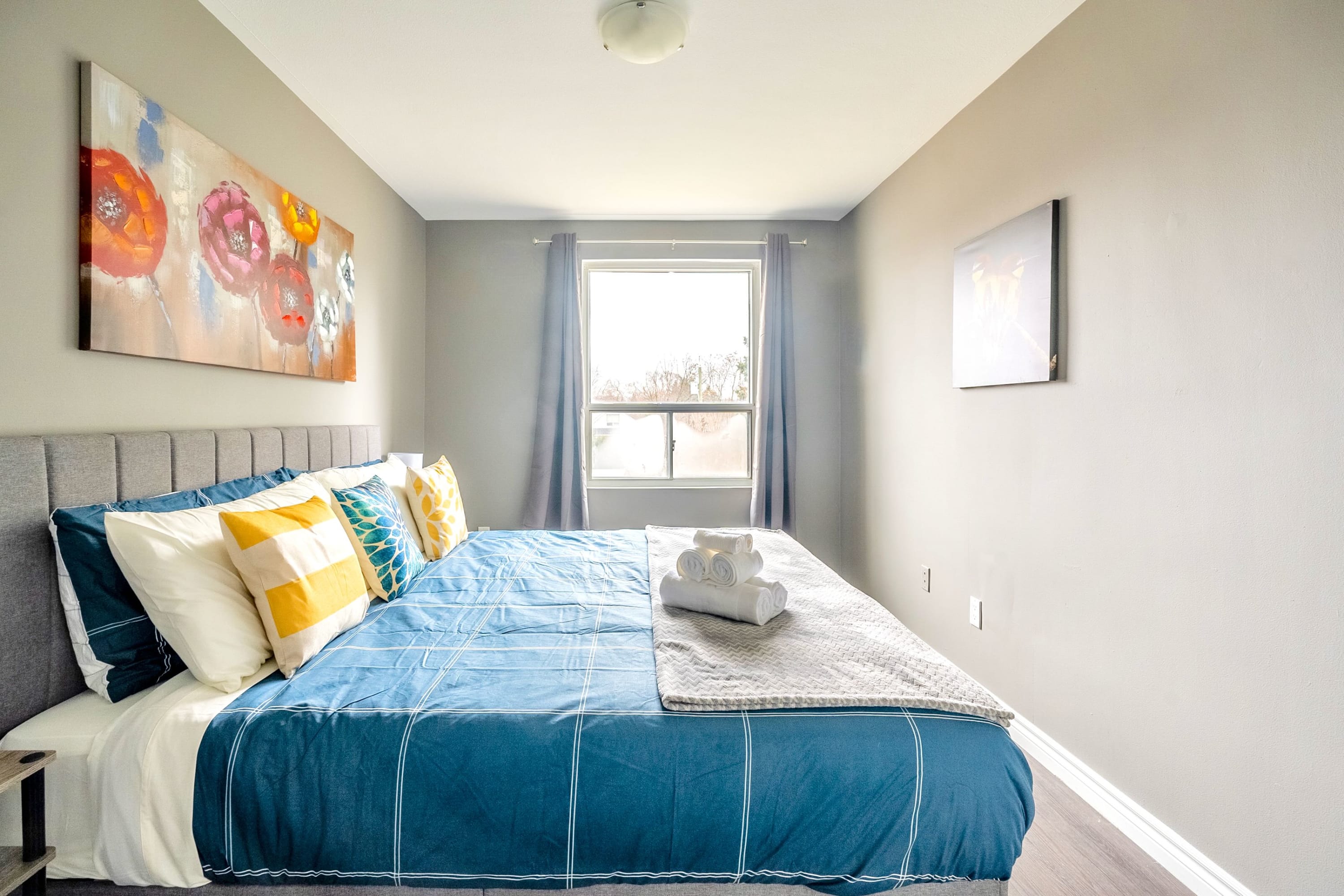 Spacious Bedroom With Queen Size Bed And A Beautiful View