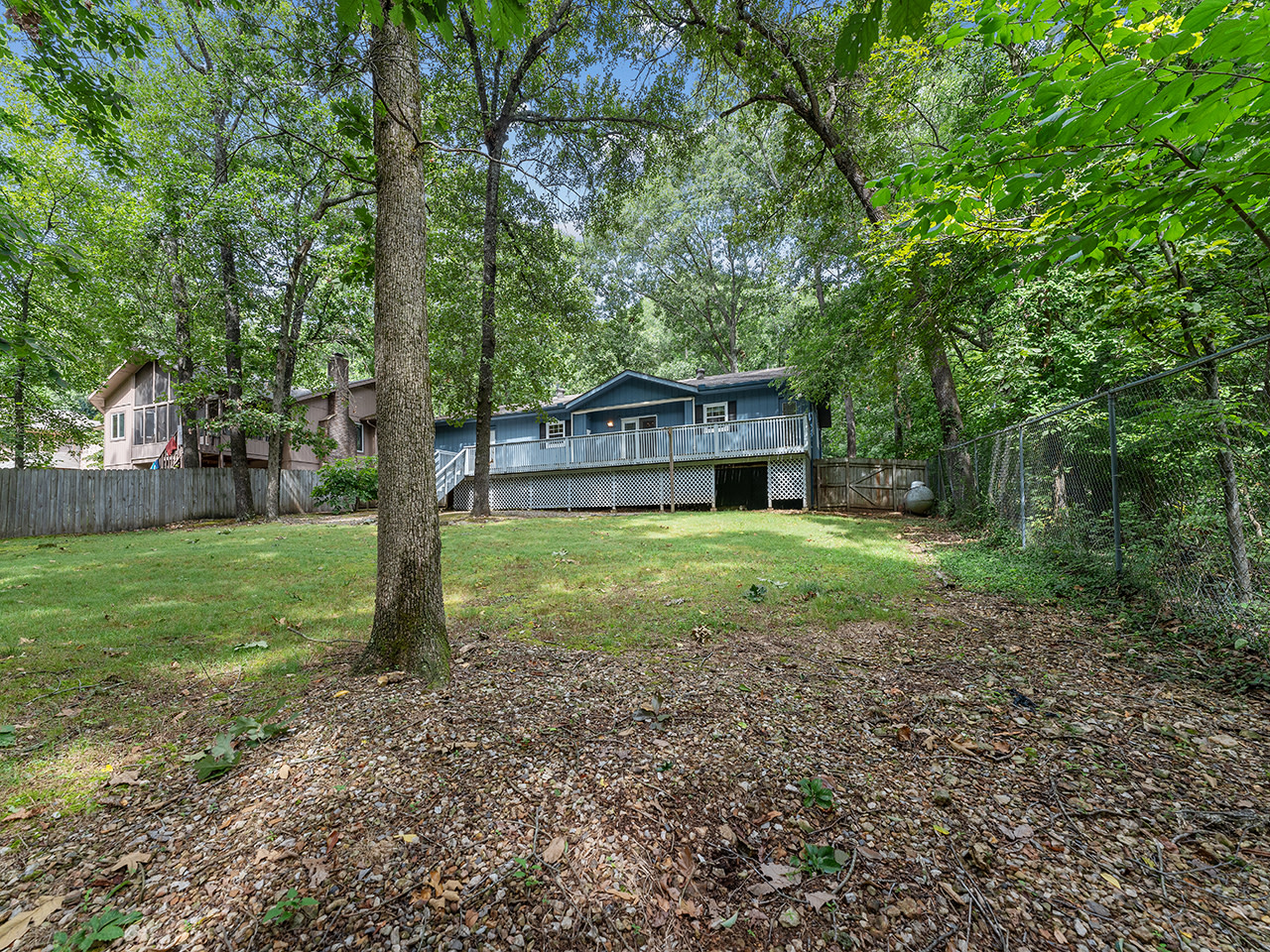 The backyard provides a BBQ and firepit to enjoy Arkansas nights