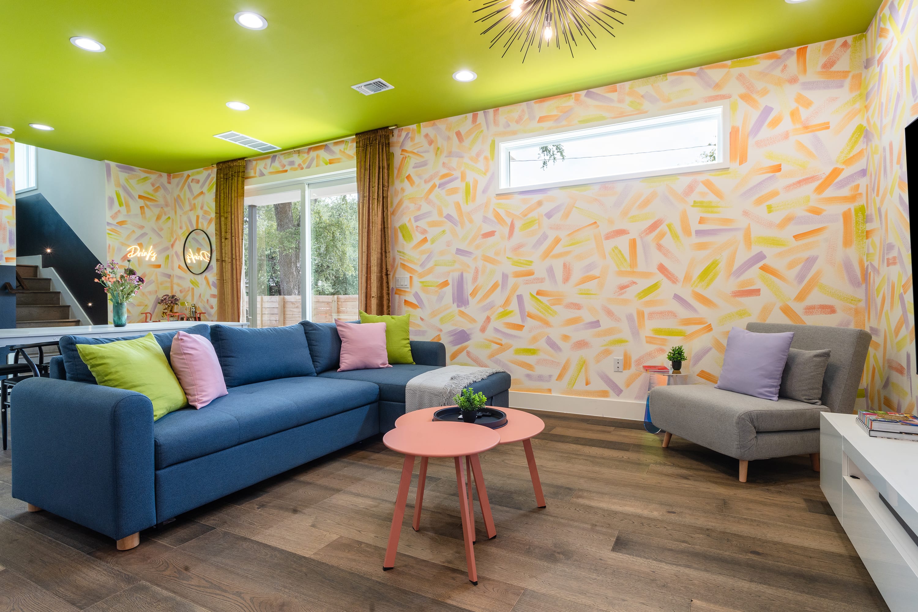 Vibrant Living Room with Queen Sofa Bed and Convertible Twin-Sized Chair Bed
