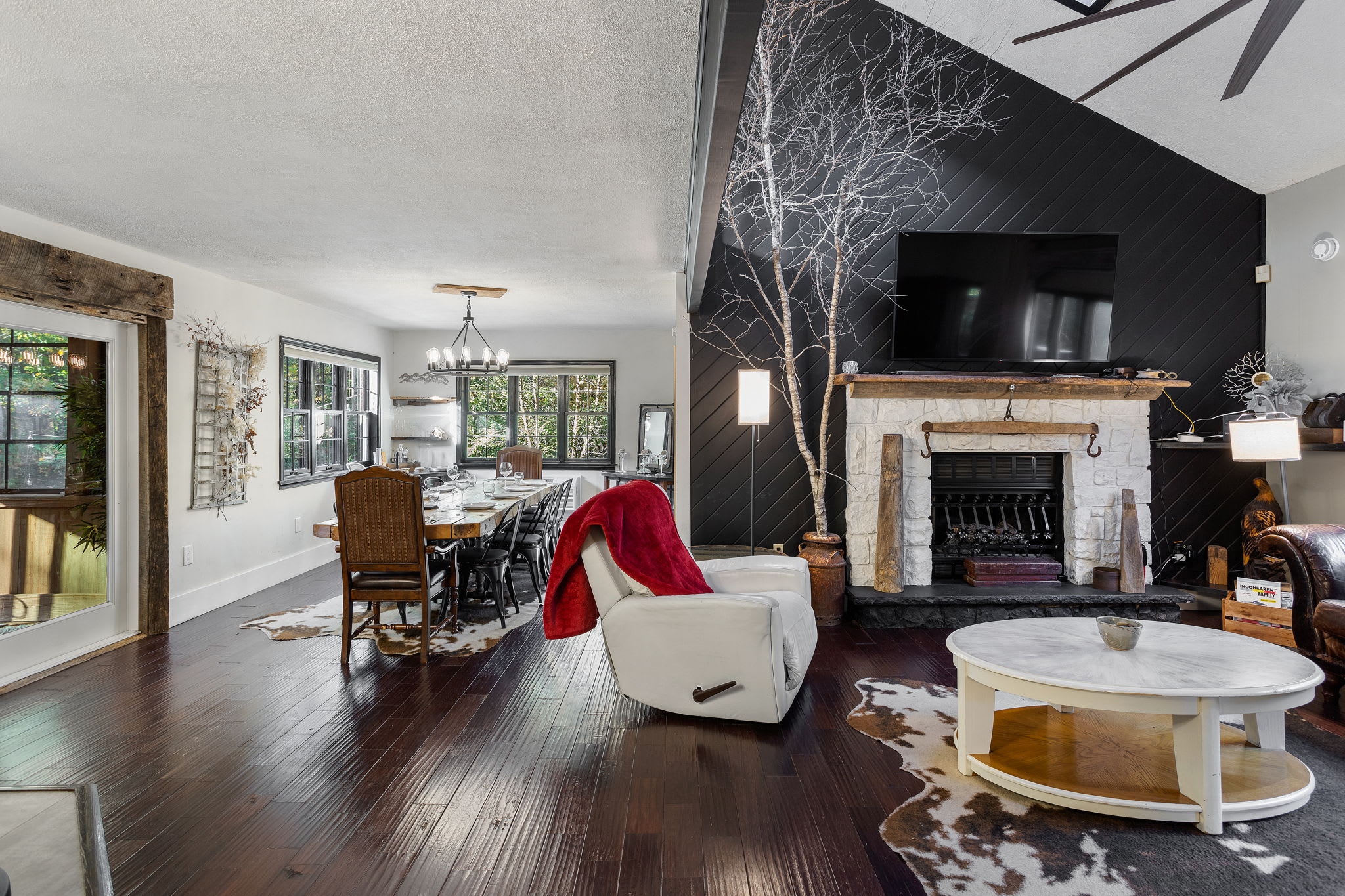 Cozy Fireside Seating – Relax by the fire in this inviting and well-designed living room.