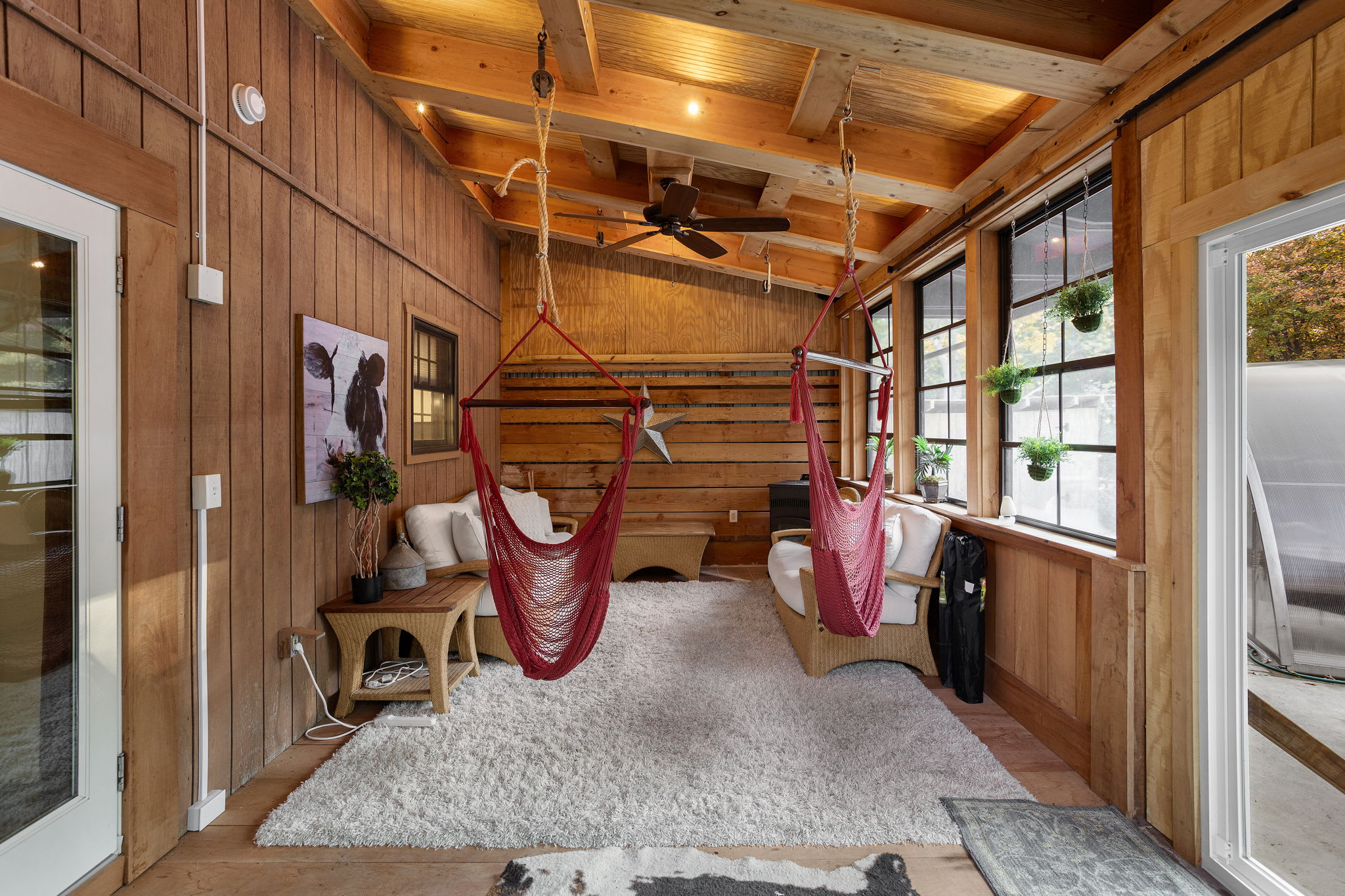 Rustic Indoor Hammock Lounge – Unwind in these stylish hanging hammocks inside a beautifully designed space.