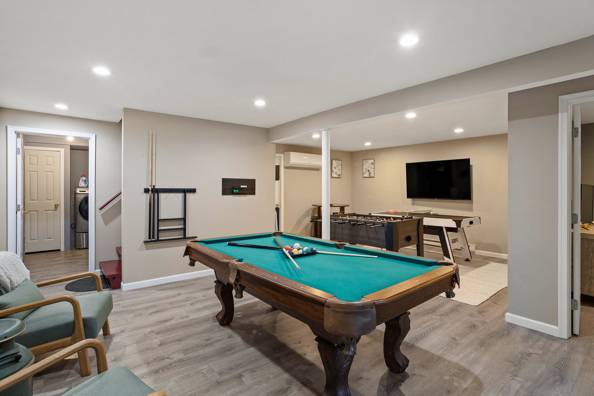 Game Room with Pool Table – Challenge friends and family to a fun game of pool in this spacious entertainment room.