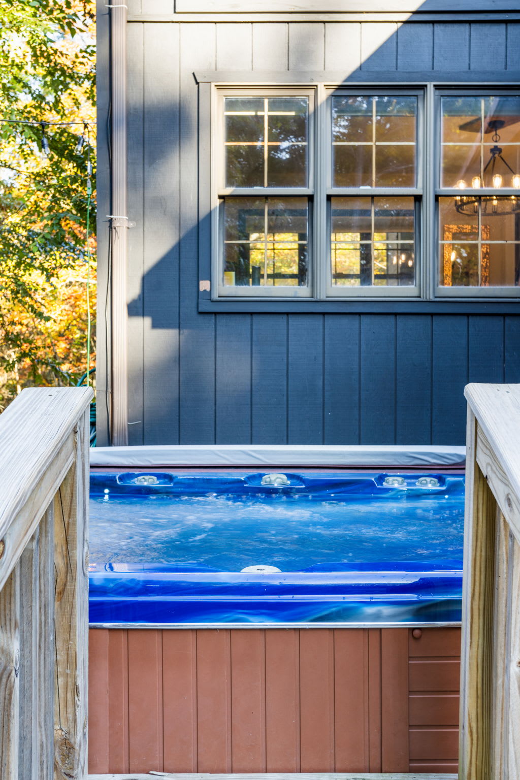 Elevated near the cabin, the hot tub offers a private perch for soaking while listening to birdsong. It’s an ideal retreat after a day of adventure.