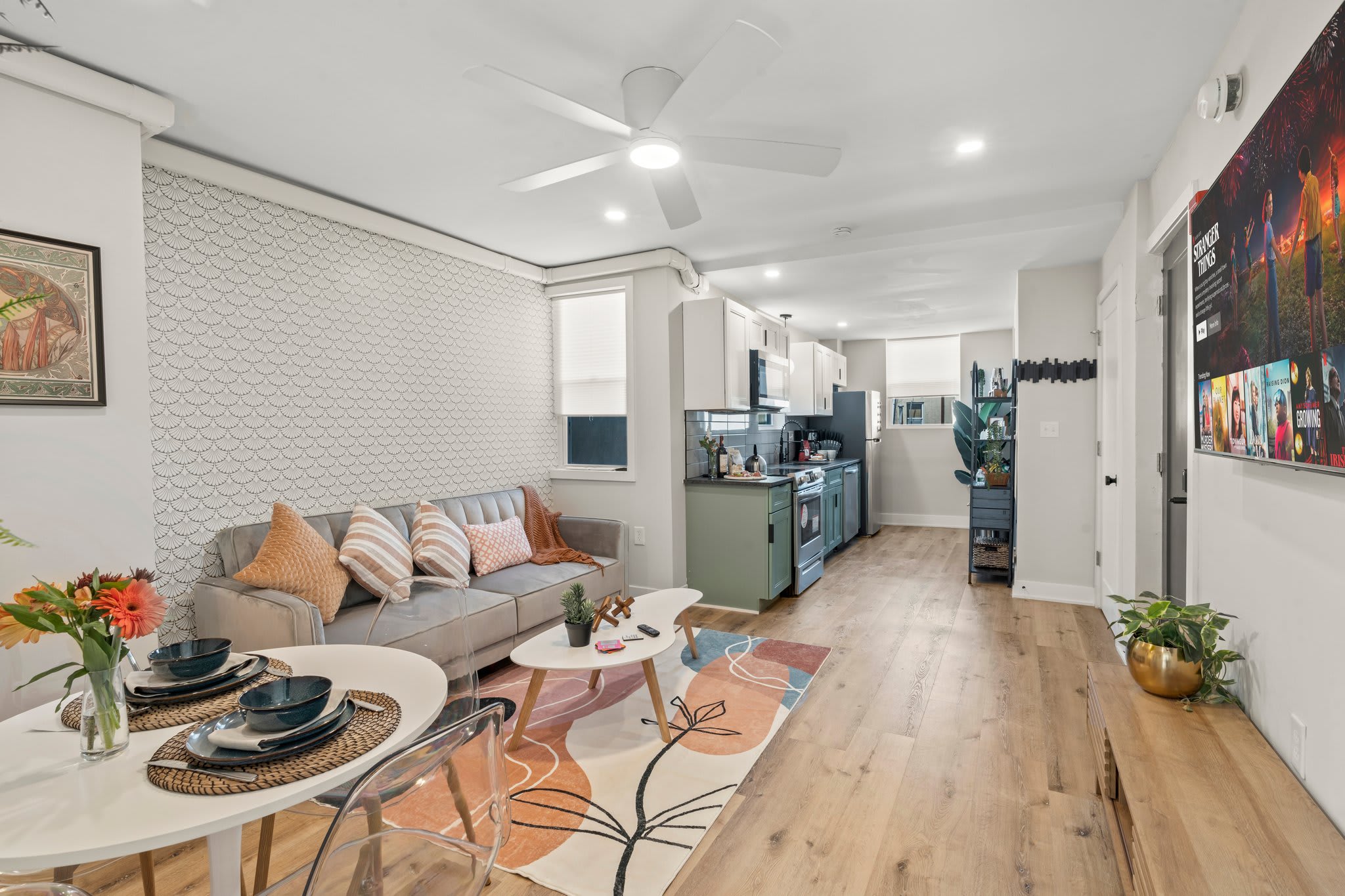Enjoy the seamless flow from the living area to the chic kitchen. You'll appreciate the open layout, making it easy to cook, dine, and relax without missing a beat. Perfect for socializing or a quiet night in.