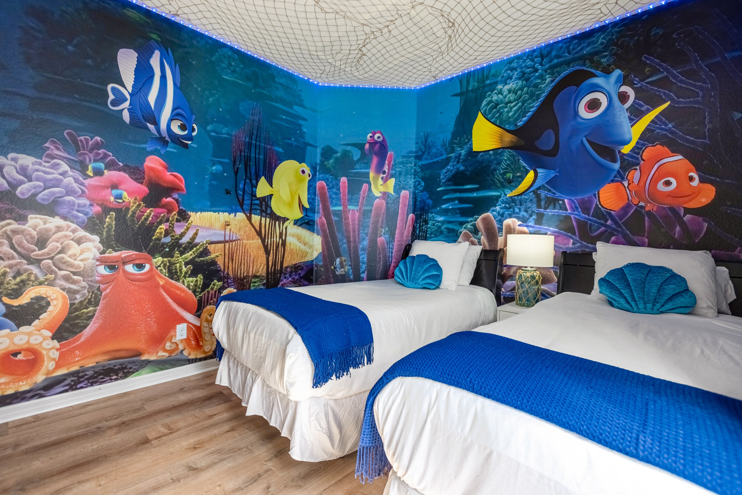 Colorful Kids Bedroom With Twin Beds And Underwater Mural
