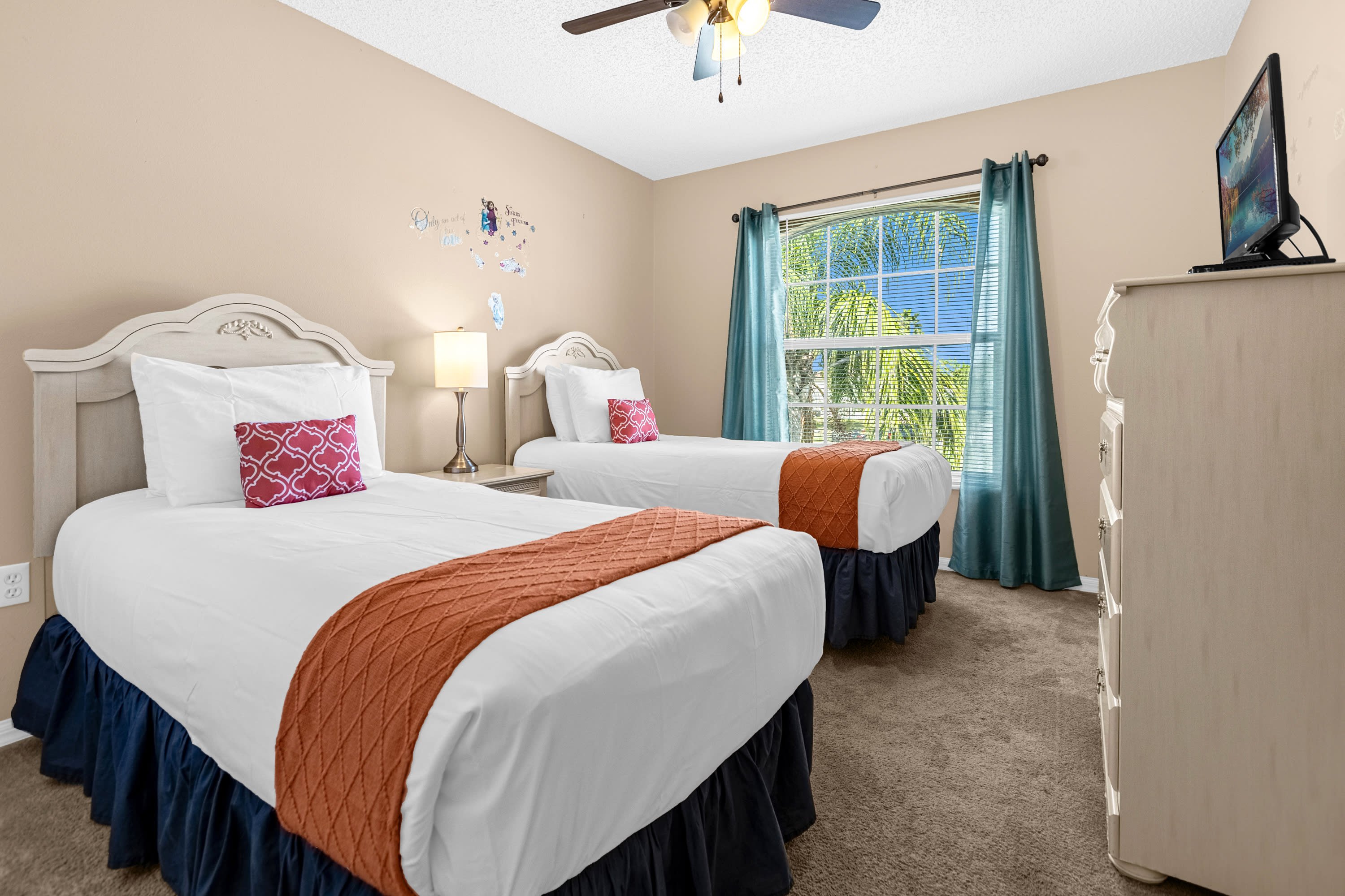 Twin Bedroom With Comfortable Beds And Scenic Views