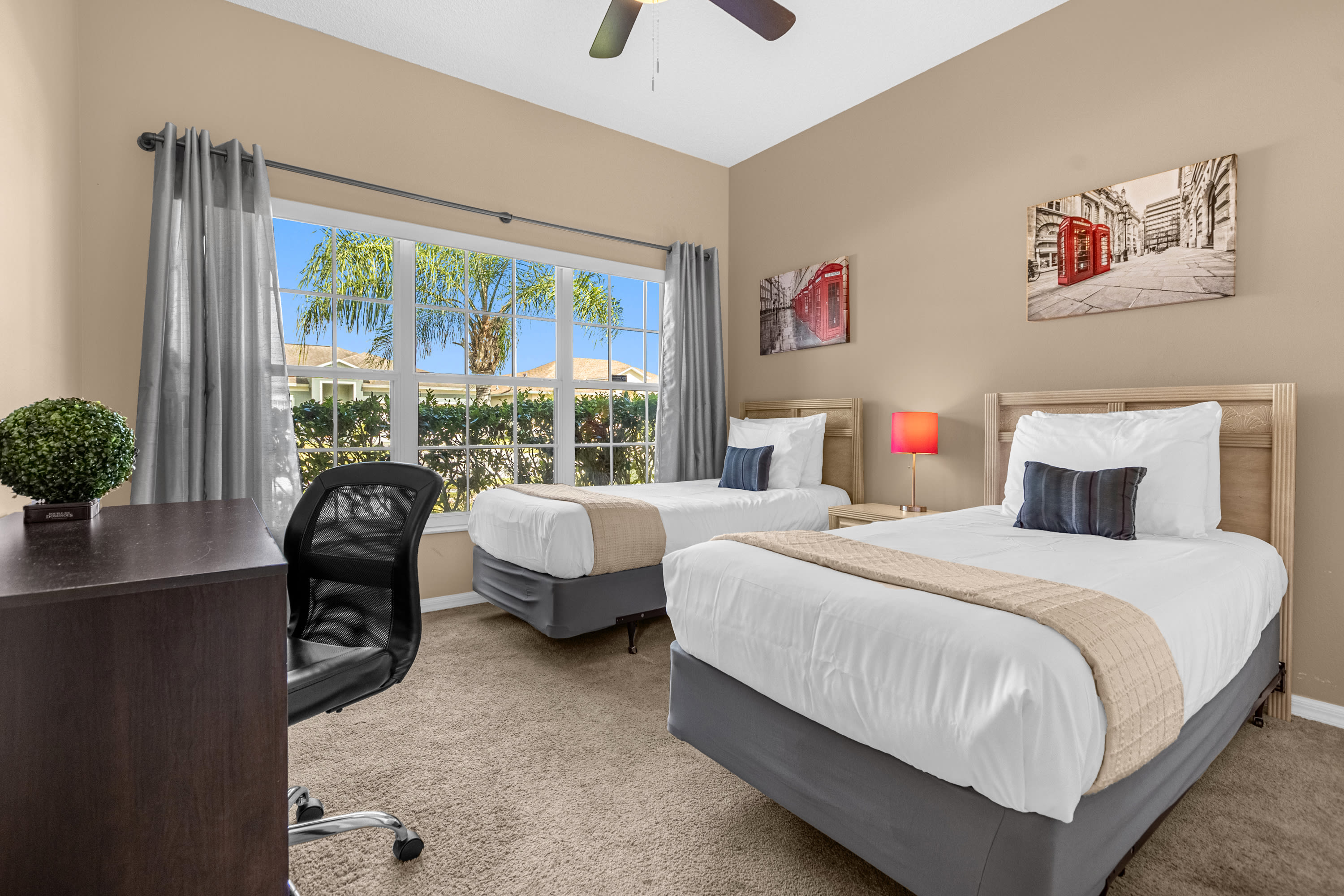 Bedroom wTwin Bedroom With Comfortable Beds And Scenic Viewsith Dedicated Workstation