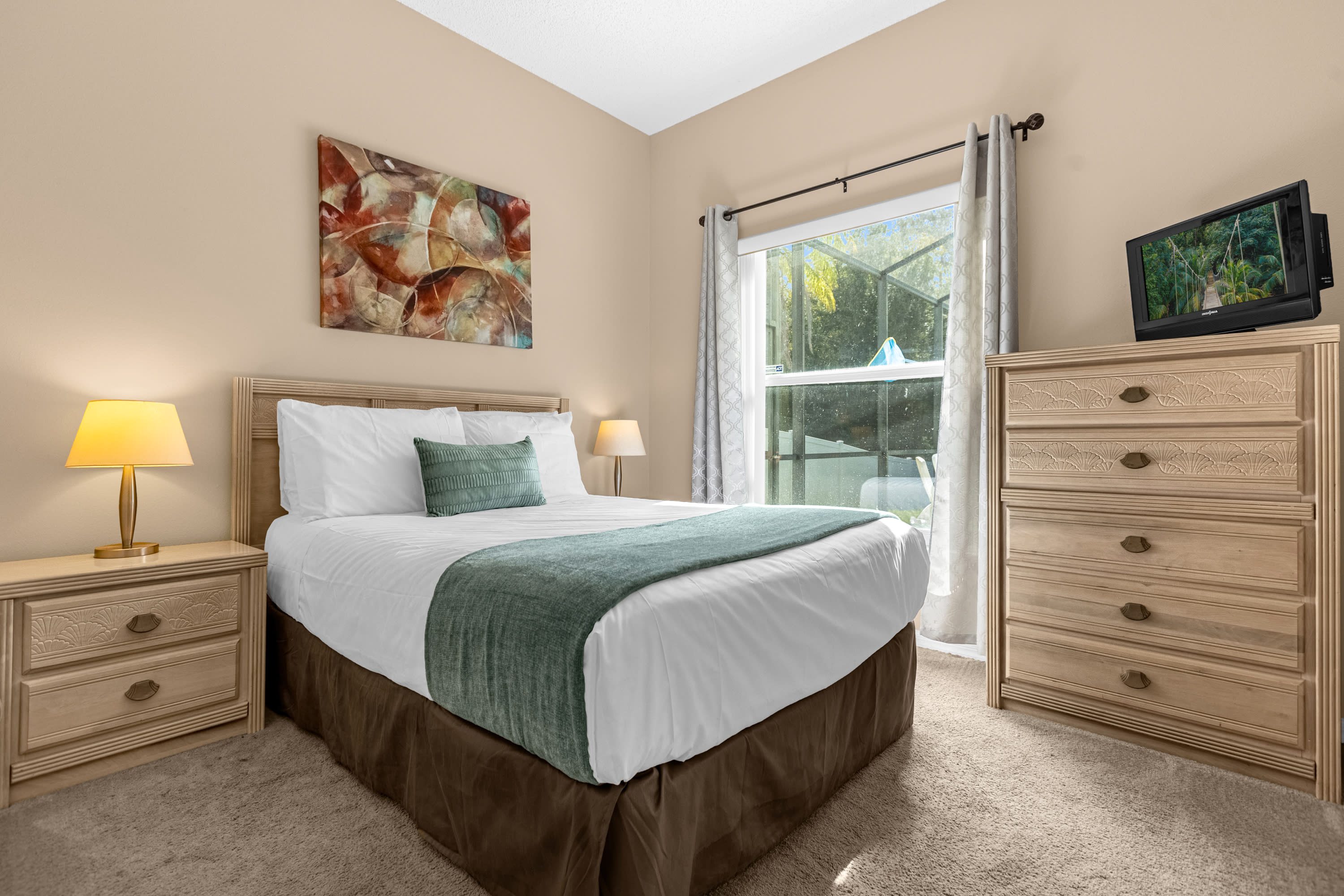 Queen Bedroom With Comfortable Bedding And Garden Views