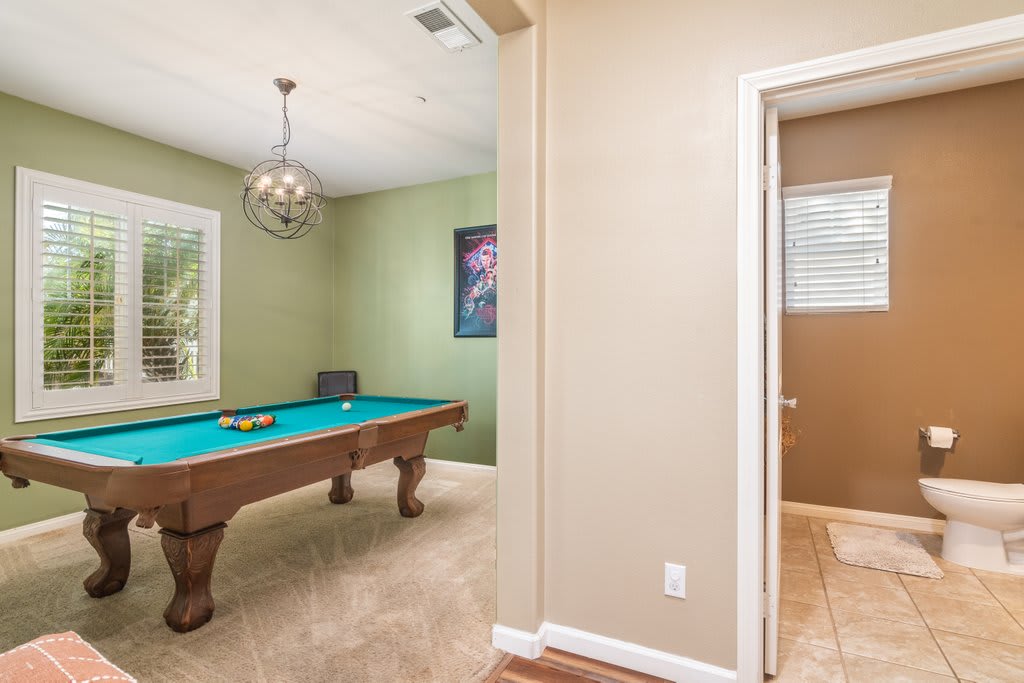 Pool table & half bath on main floor