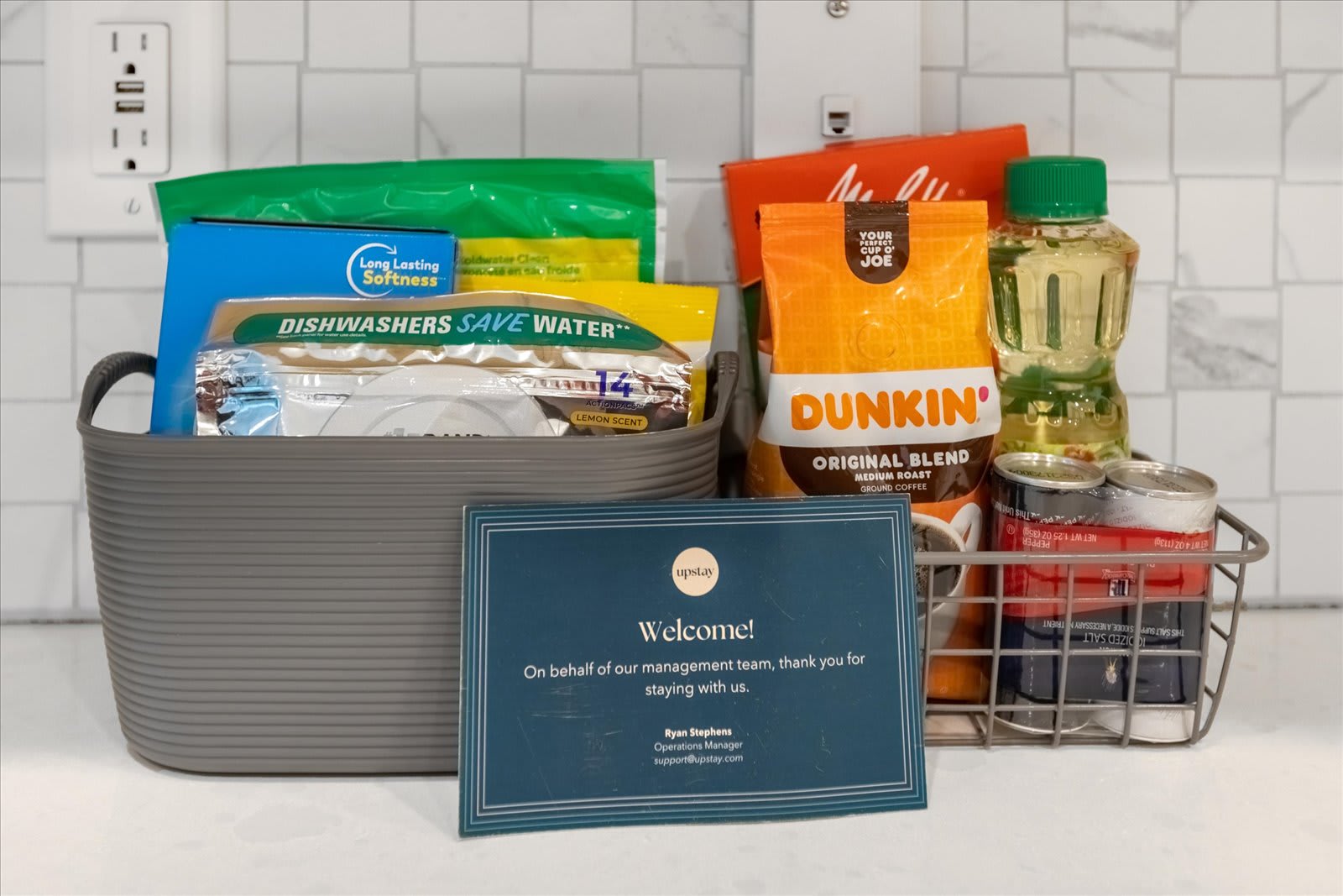 Start Your Stay With This Thoughtful Welcome Basket Full Of Treats