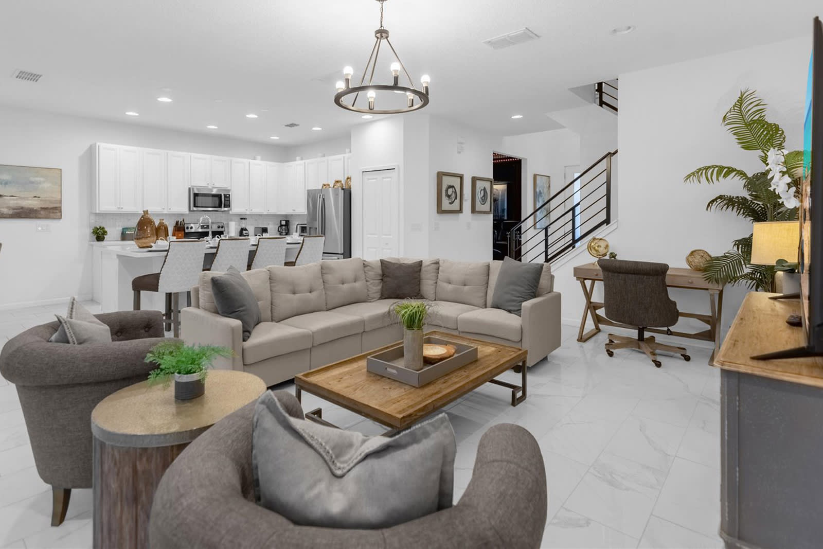 Relax In This Spacious Living Room With Comfortable Seating And A Smart TV