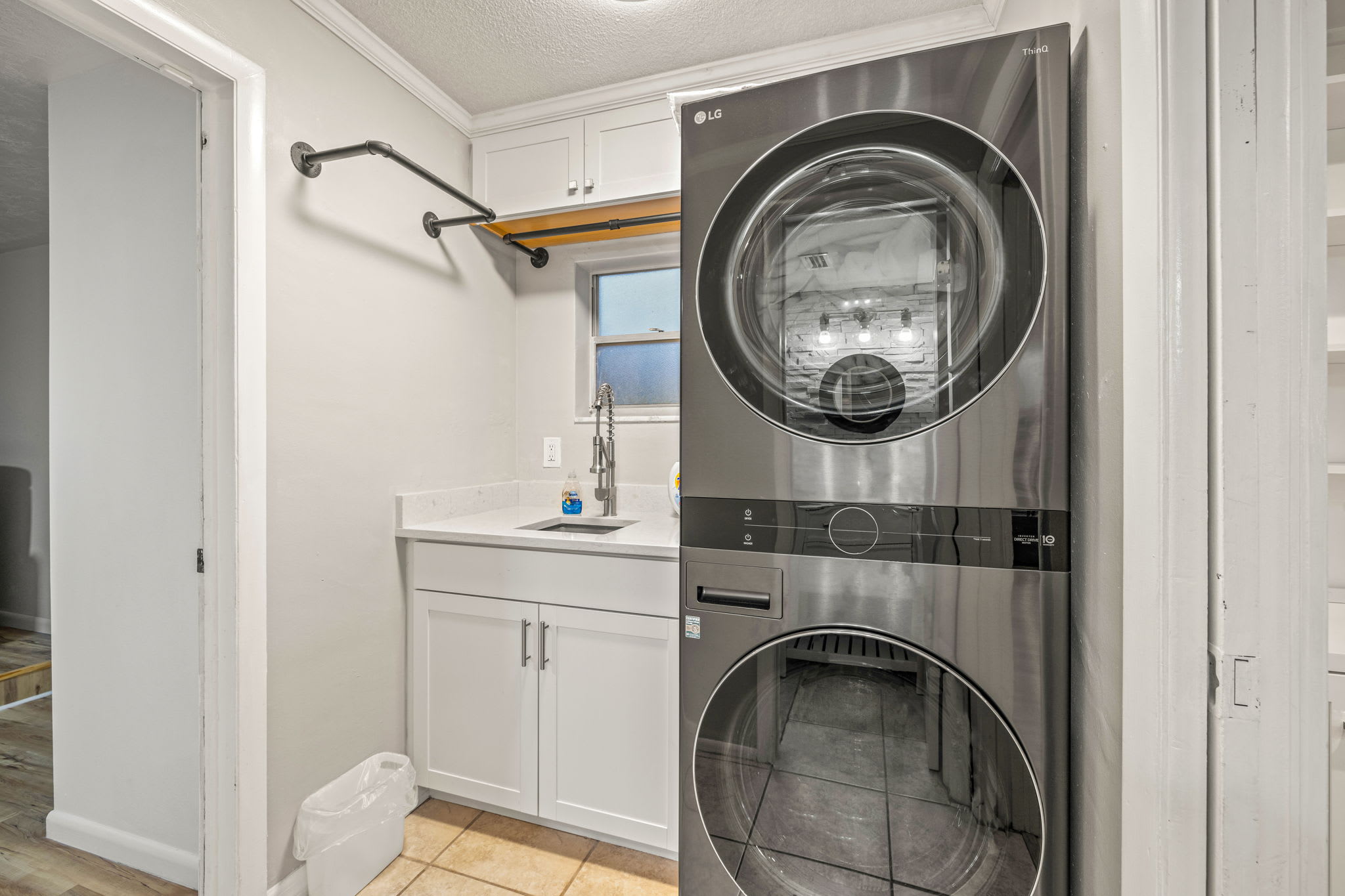 Full laundry room with washer and dryer