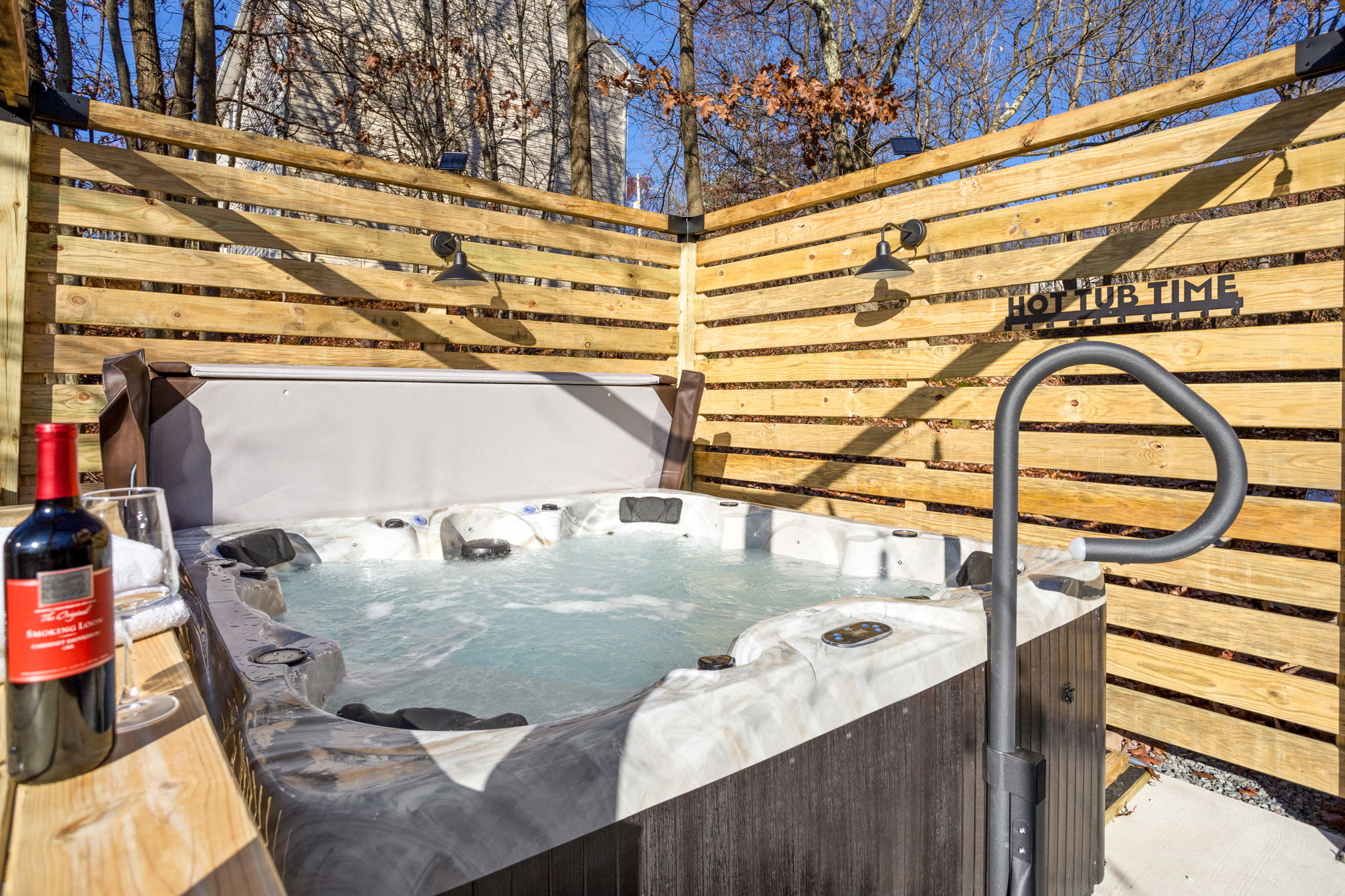 Soak away your worries in this bubbling hot tub, tucked into a private wooden enclosure. With warm jets and a glass of wine in hand, relaxation comes naturally here.