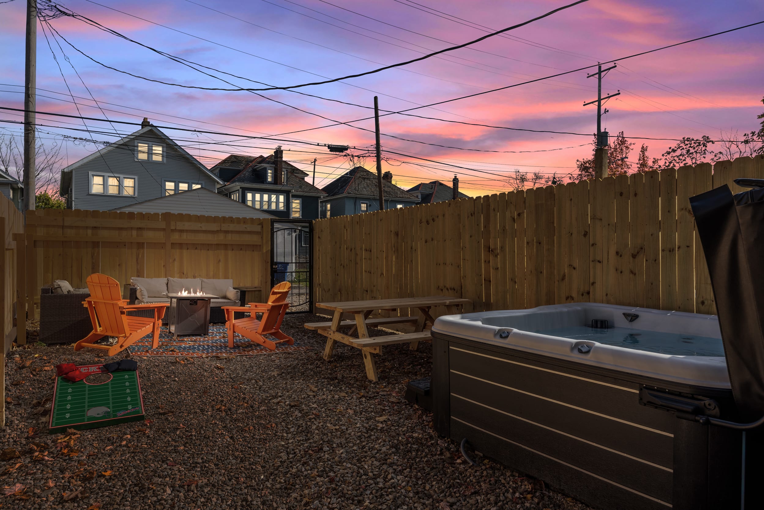 Hot tub, games, seating, cornhole- an outdoor oasis!