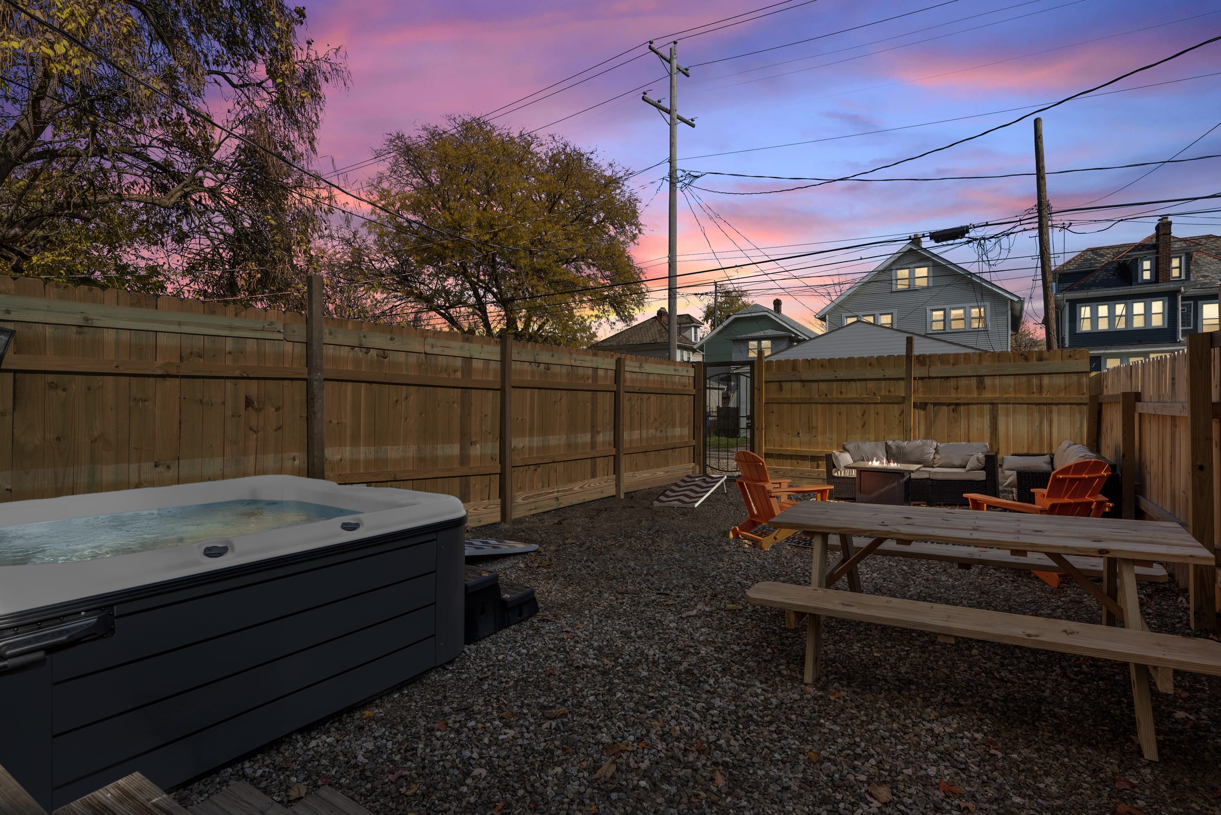 Hot tub, games, seating, cornhole- an outdoor oasis!