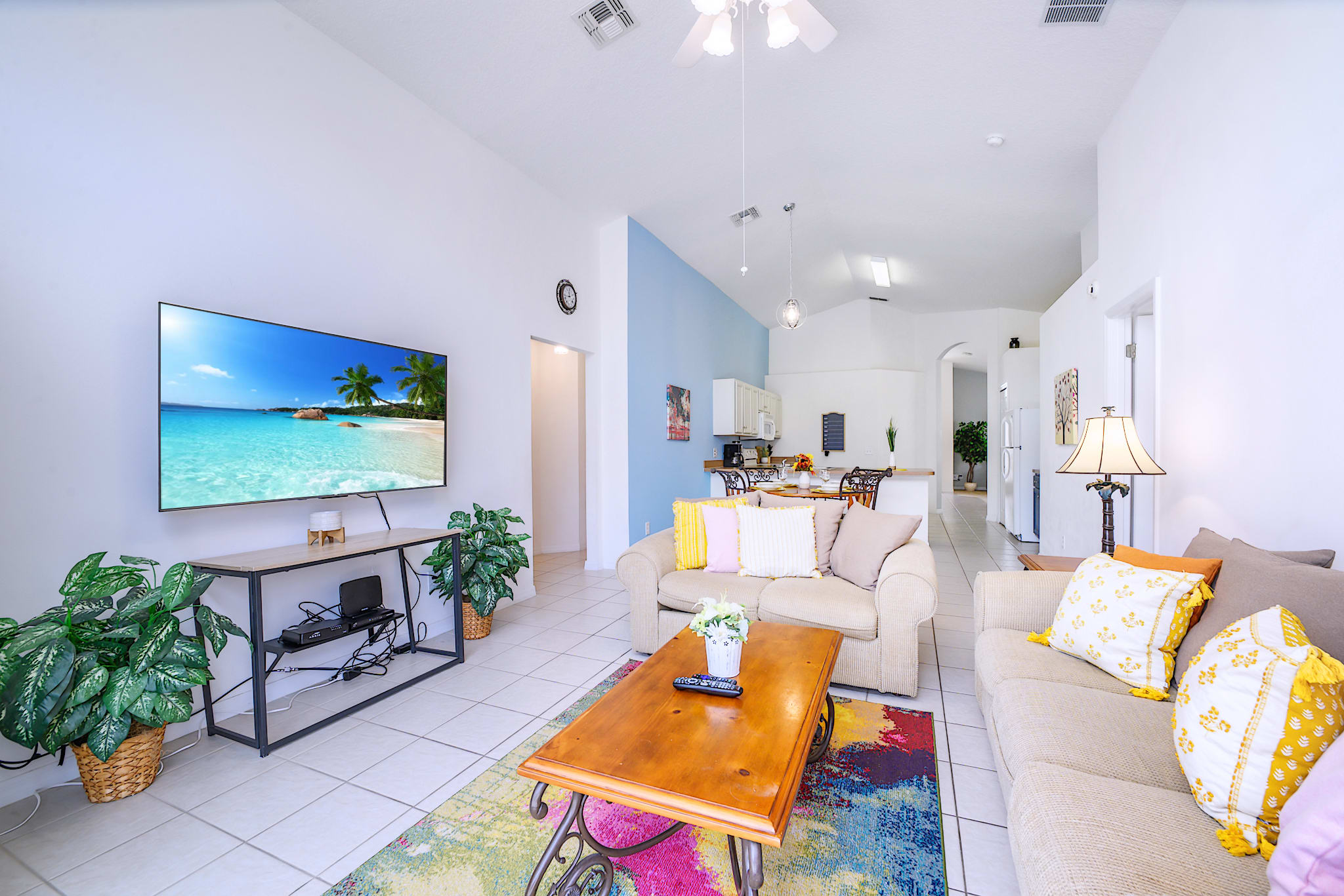 Comfortable Family Room with a Smart TV and Pool View