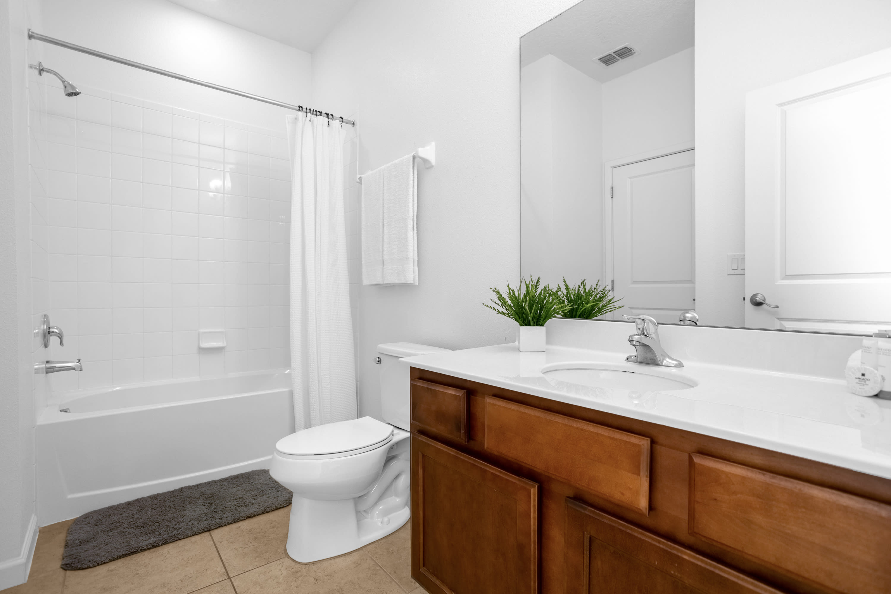 Modern Bathroom with Shower-in-Tub Design