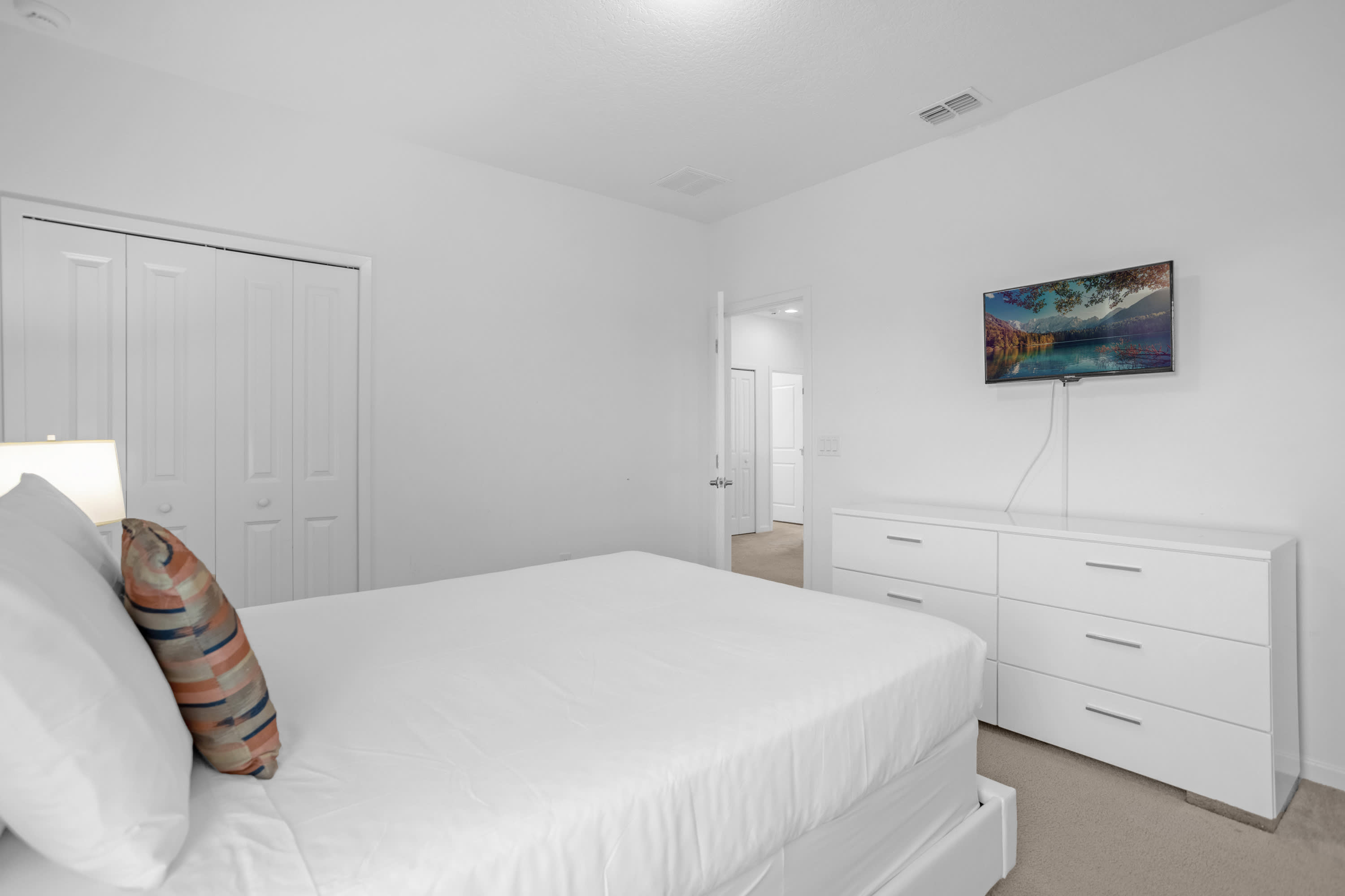 Queen Bedroom With Smart TV And Minimalist Décor