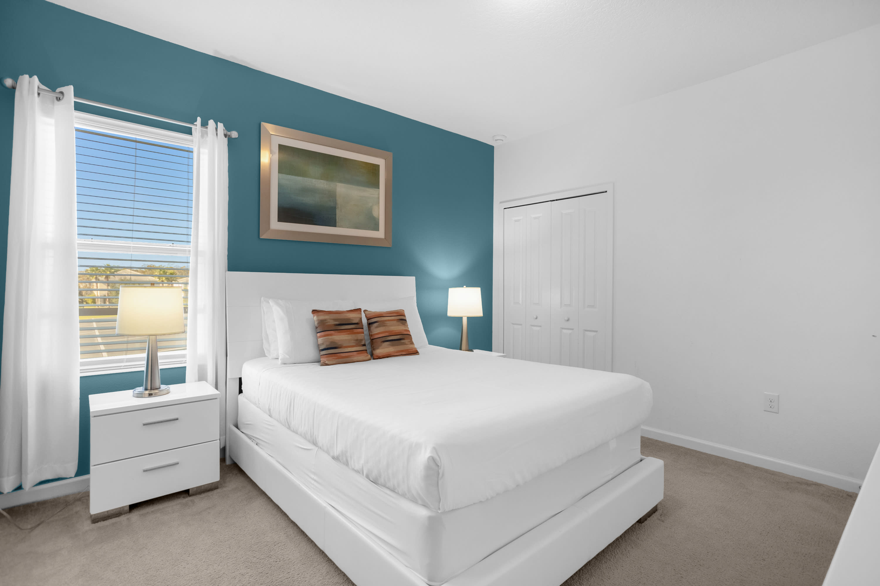 Modern Bedroom With A Queen Bed And Stylish Accents