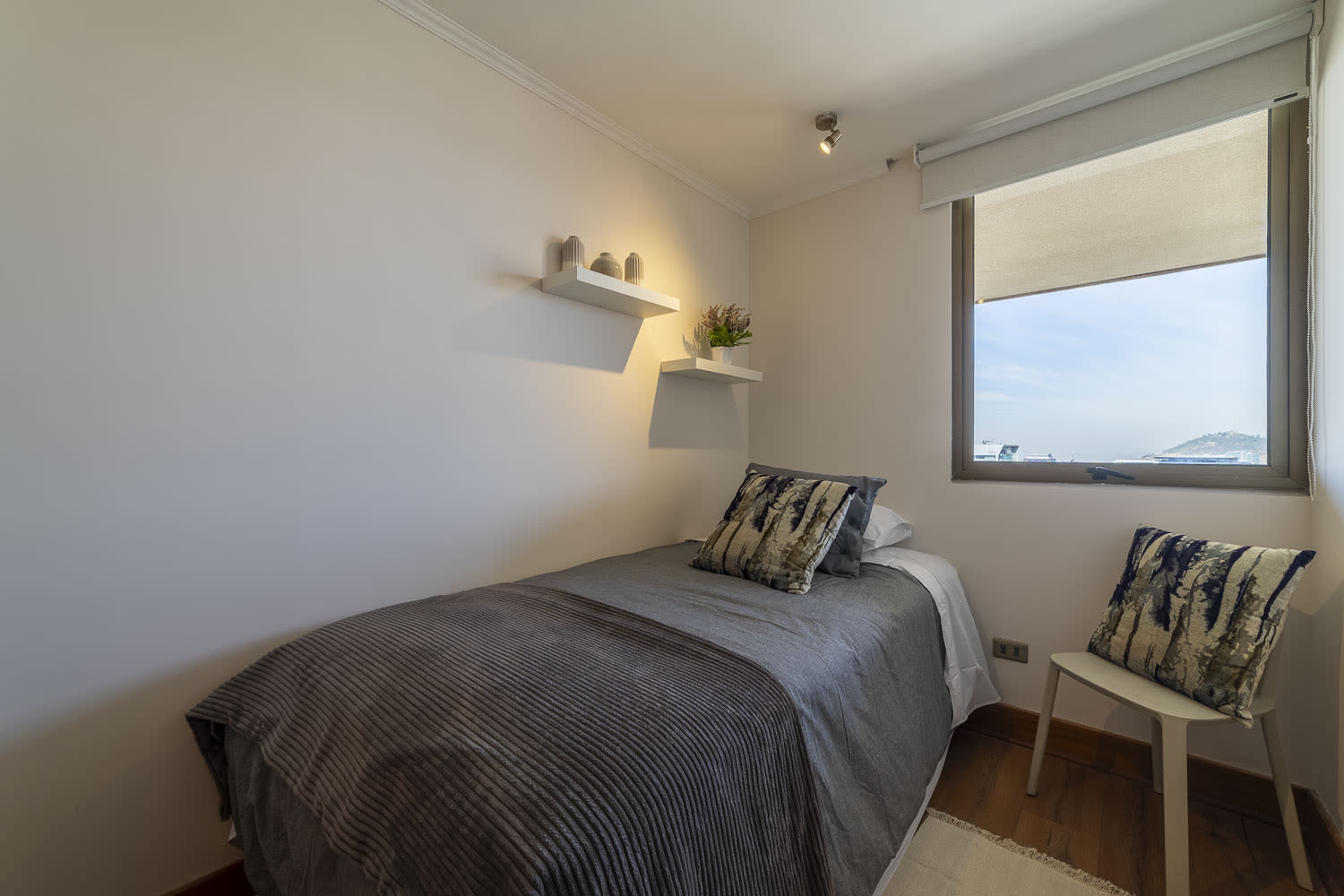 Cozy bedroom with a stunning view, perfect for a peaceful retreat in the heart of Chile.