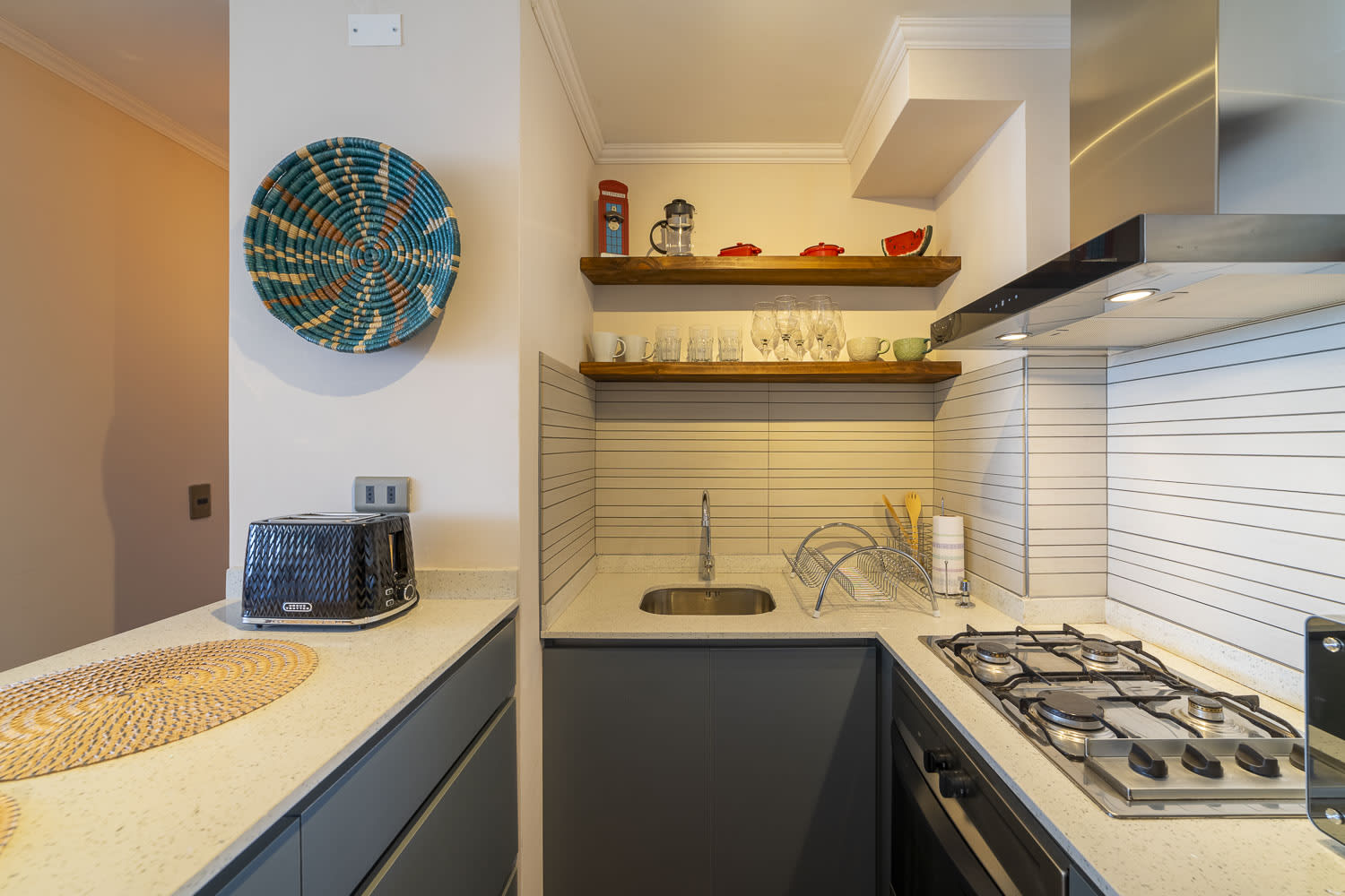 Charming and efficient kitchen with modern amenities, perfect for cooking a cozy meal in the heart of your Chilean getaway.
