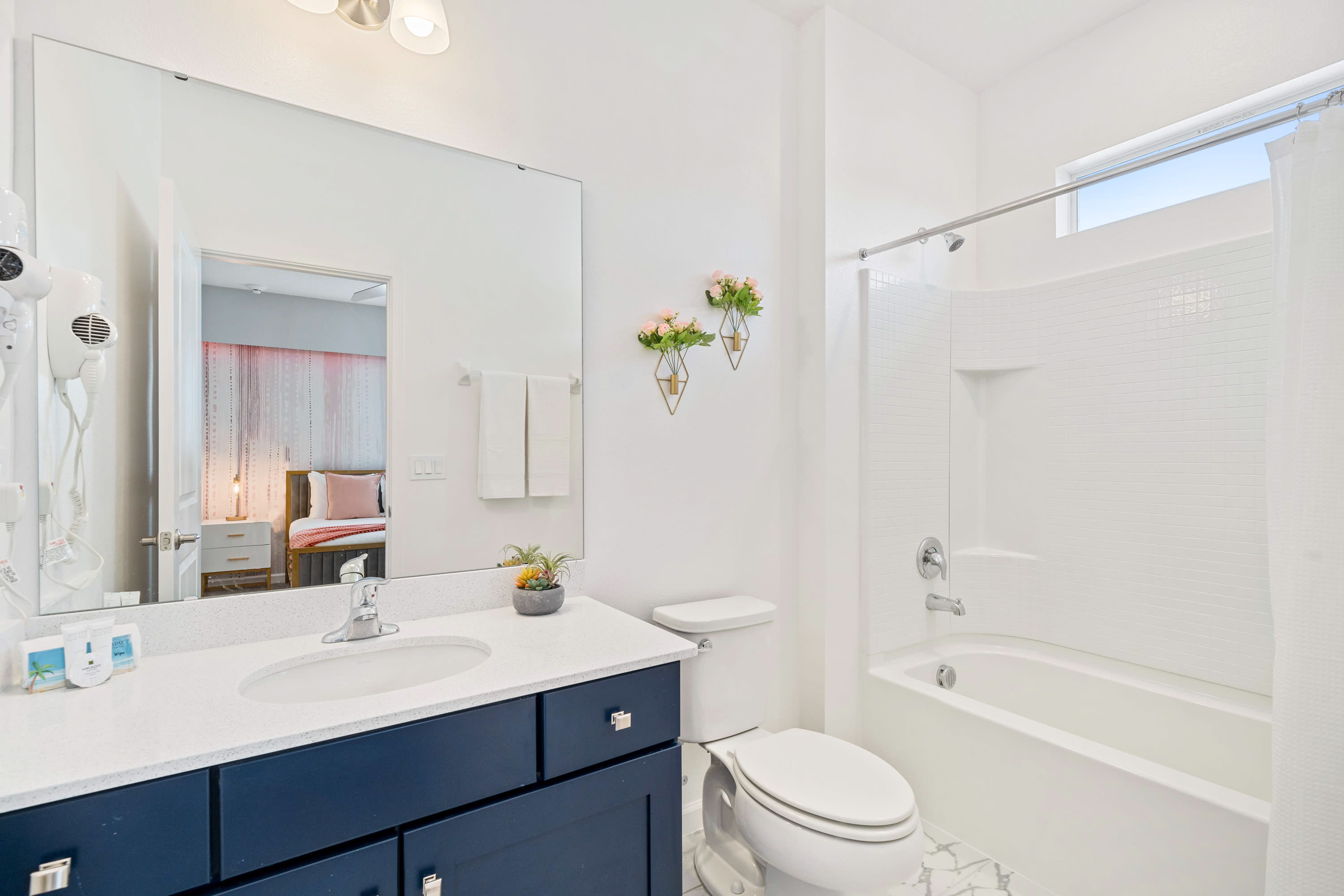 Bright Bathroom With A Clean Design And Elegant Vanity